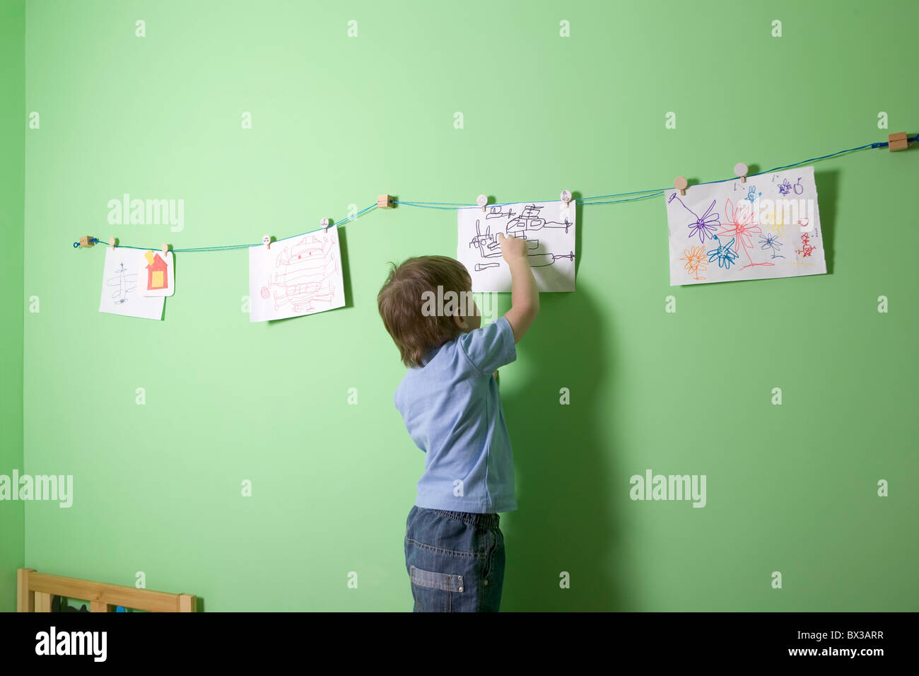 young boy making drawing Stock Photo - Alamy