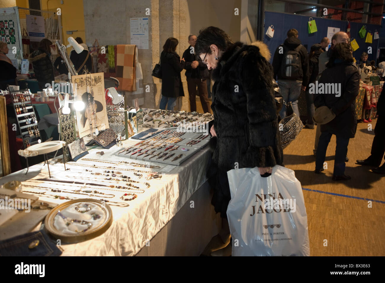 Paris, France, people Shopping at 'Lions CLub' Christmas market, Le Marais District, woman and global economy Stock Photo