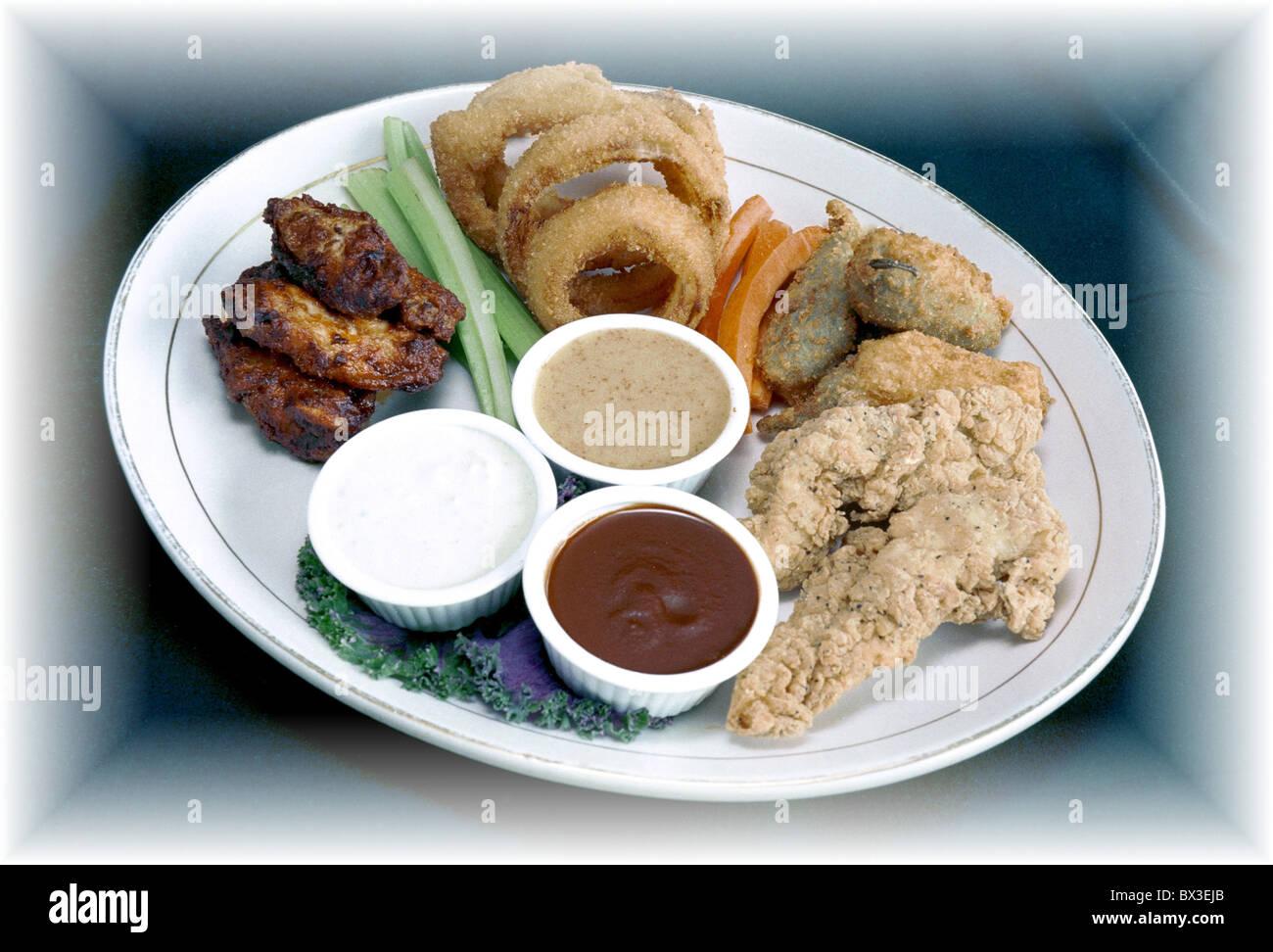 food gastronomy culinary sampler platter spicy buffalo wings onion ...