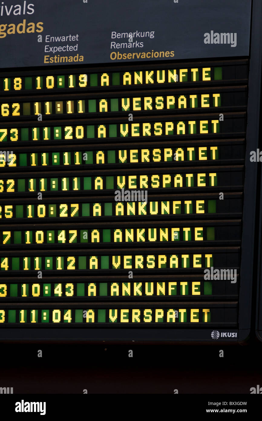 Arrivals board at Tenerife airport showing delays for flights Stock Photo