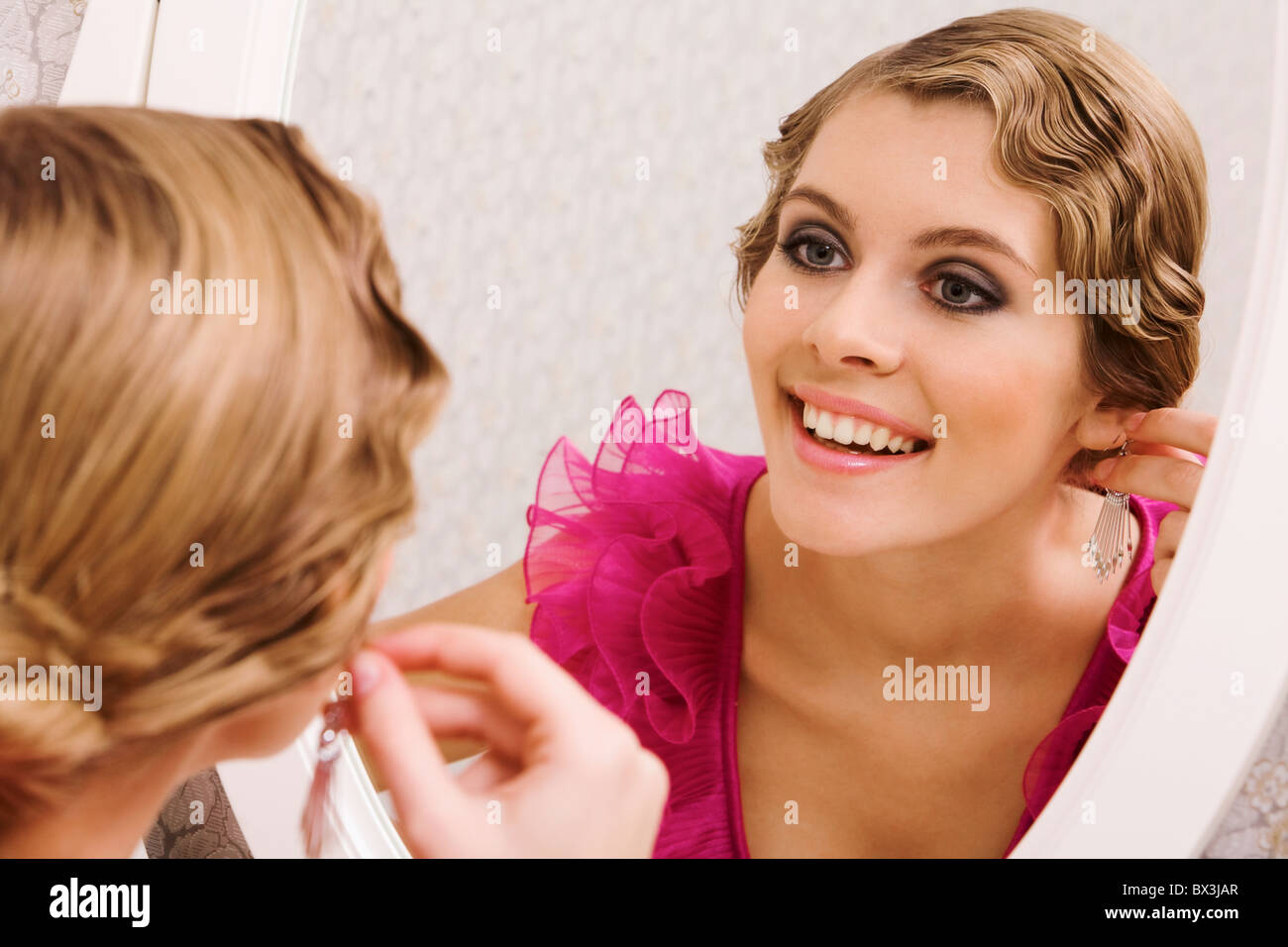 Girl Wearing Earrings Stock Photos & Girl Wearing Earrings 