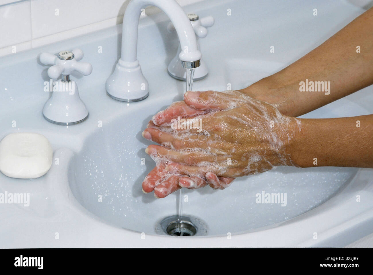 cleanness clean hands wash hands washings soap toilet wash basin water Stock Photo