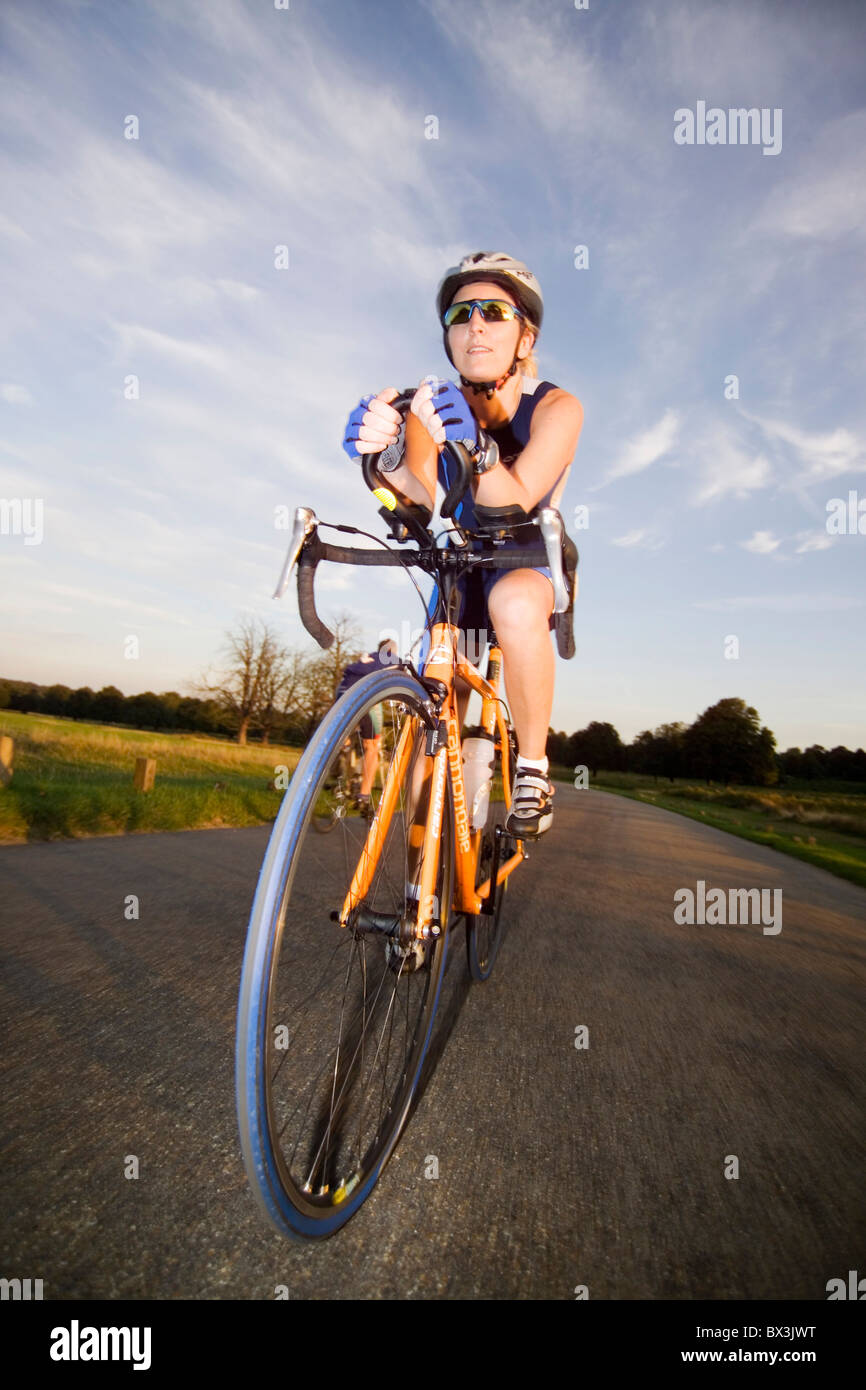 cycle pushbike racing bike ride compete road race win distance time speed pace gloves helmet lycra sho Stock Photo