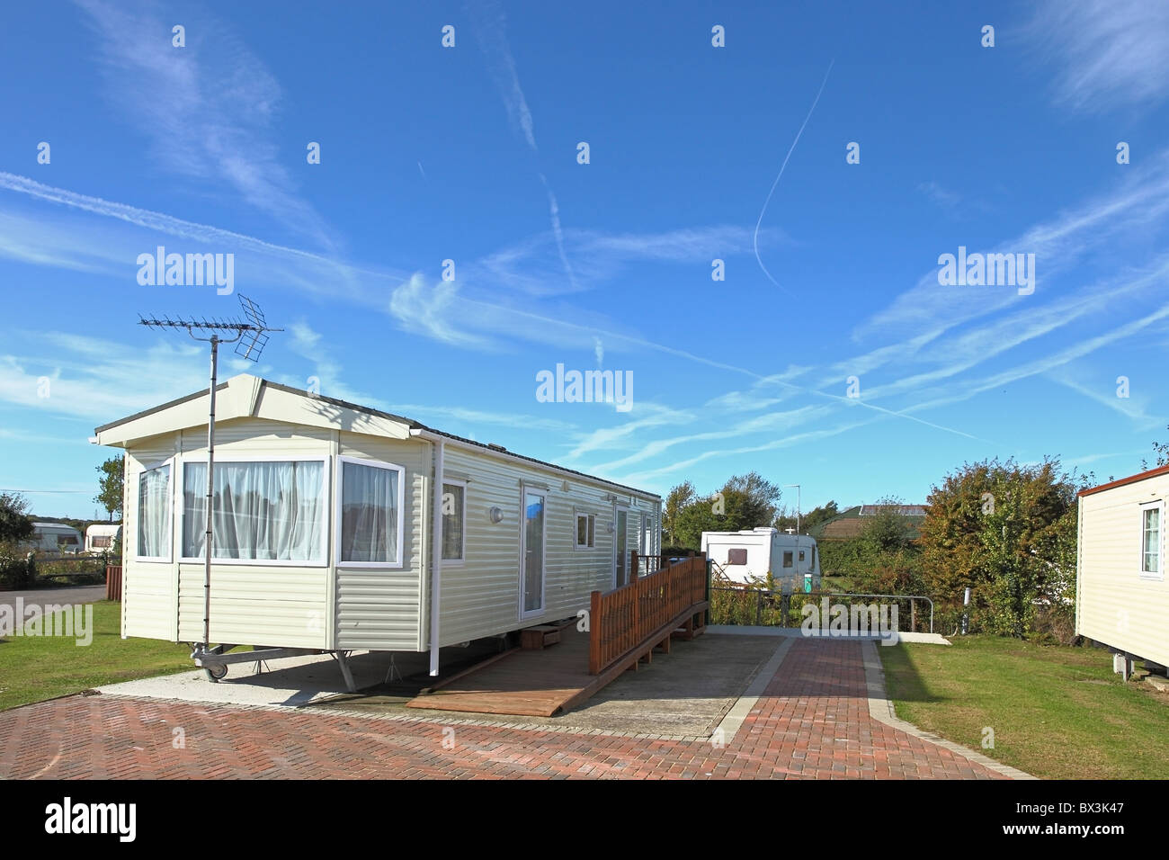 A luxury caravan holiday home sited on a smart caravan park - UK. Note, the access ramp for disabled persons. Stock Photo