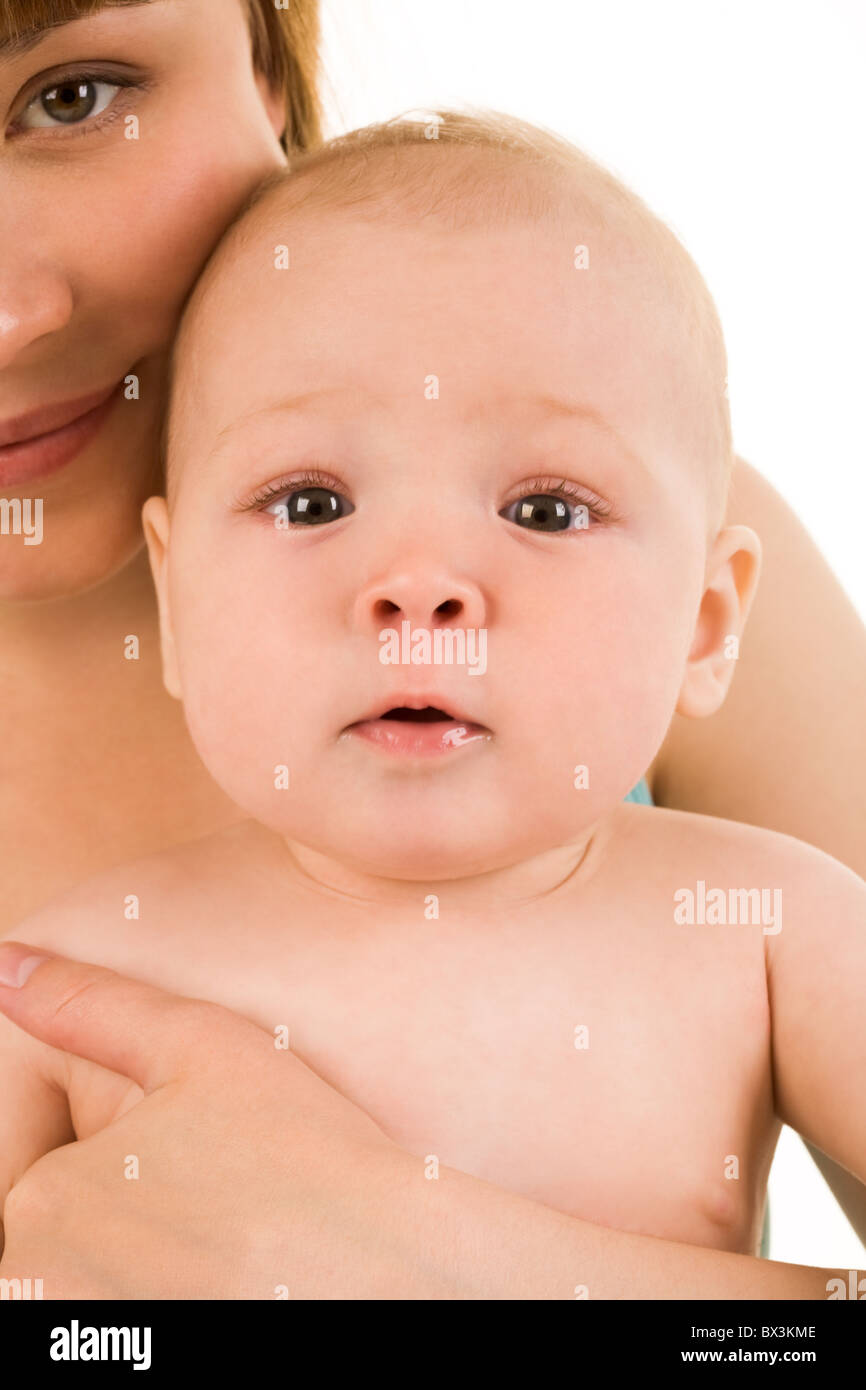 Image of pretty woman with her little baby on white background Stock Photo