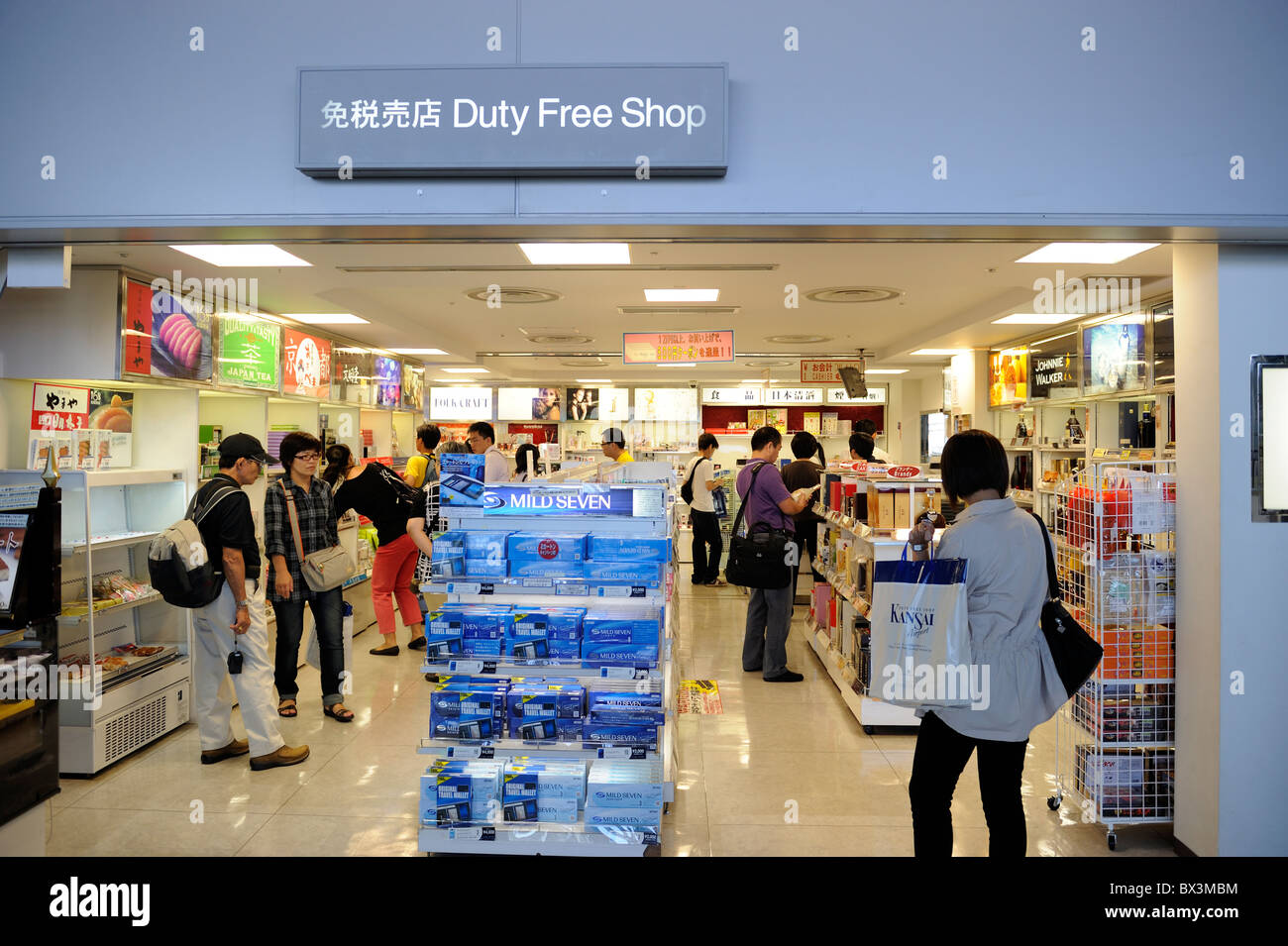 Chinese tourists shopping at duty free shop in Kansai international airport in Japan. 22-Sep-2010 Stock Photo