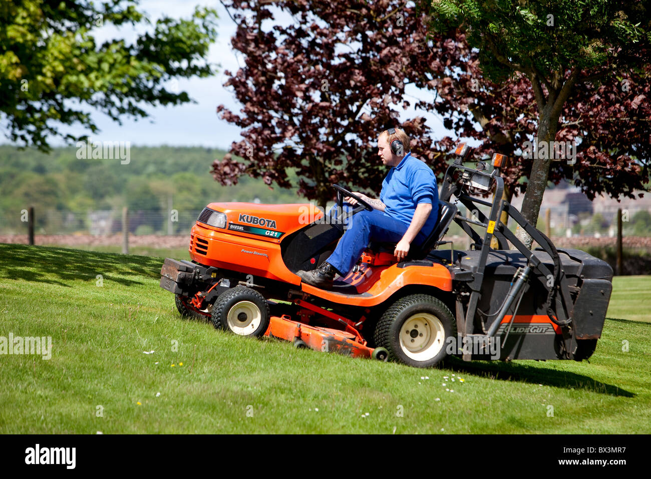 motorized 'Kubota Groundclear' lawn mower in use. Montrose Scotland Stock Photo