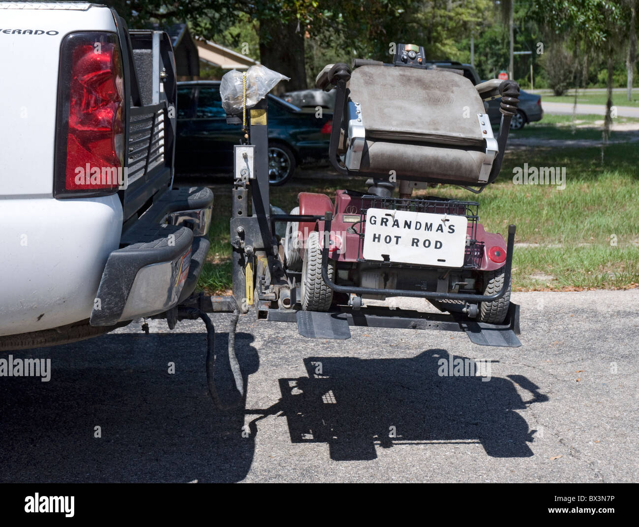 motorized wheelchair on back of pickup truck Stock Photo Alamy