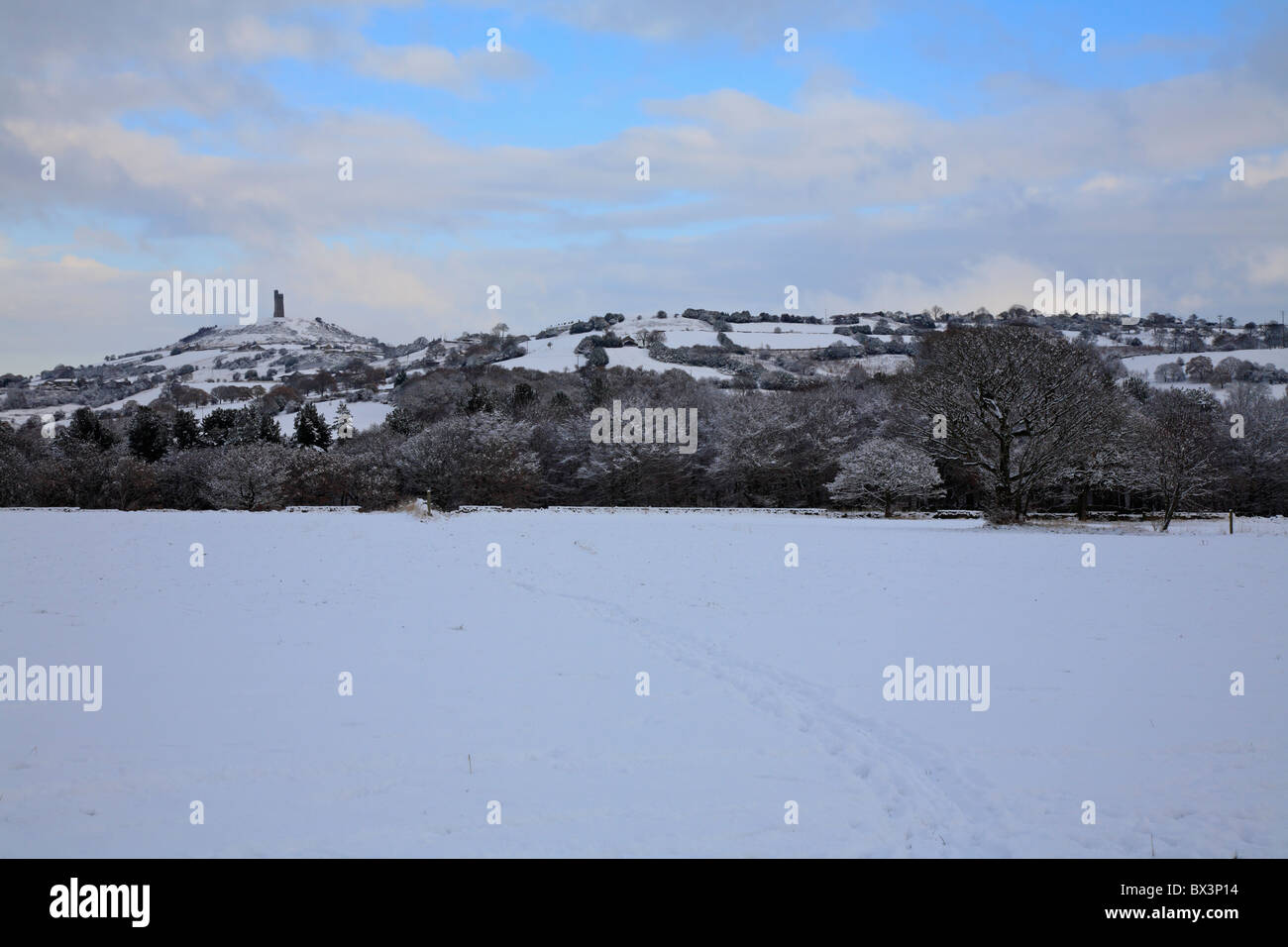 Deep snow in Honley fields and distant Jubilee Tower on Castle Hill, Huddersfield, West Yorkshire, England, UK. Stock Photo