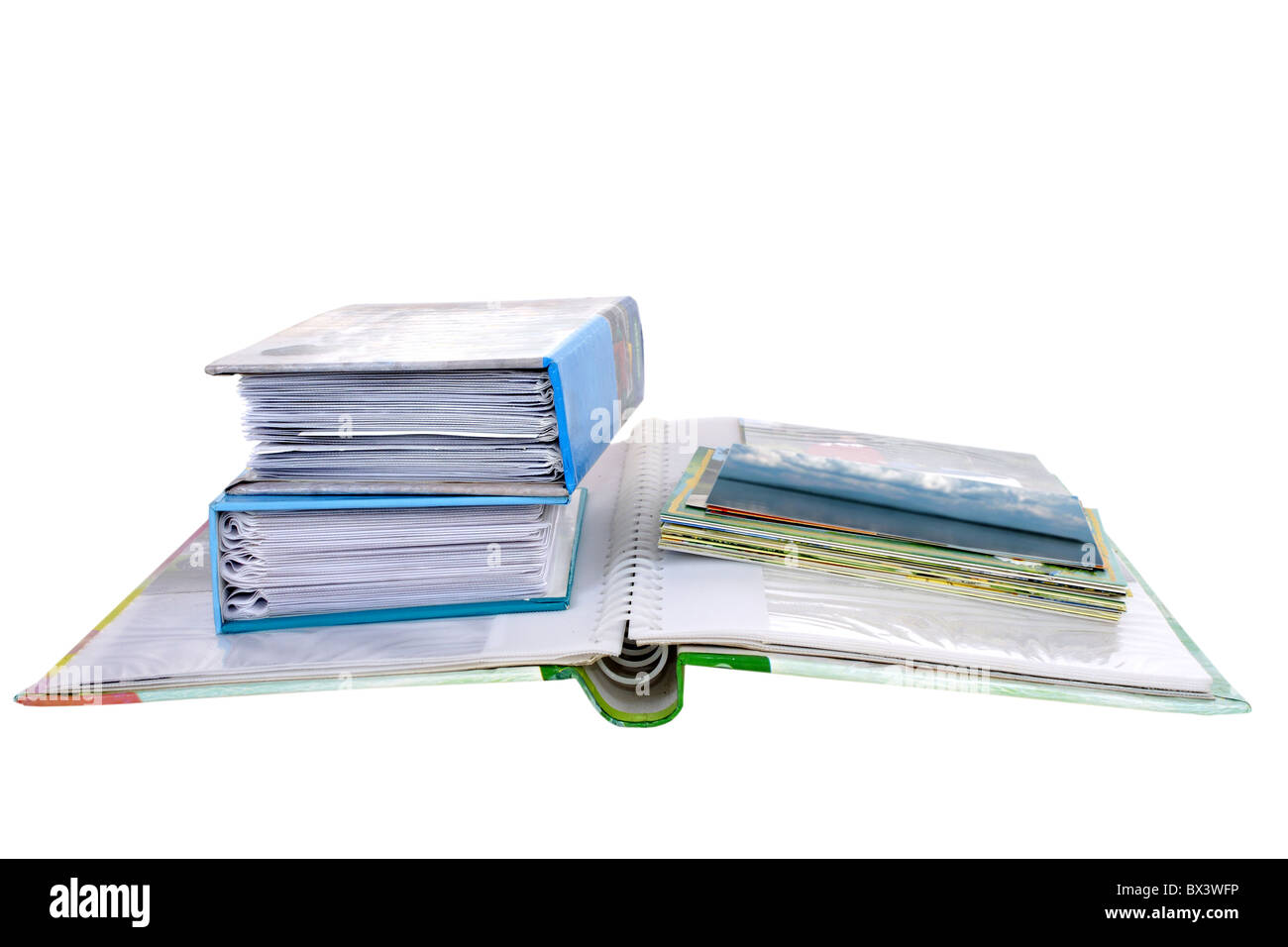 Pile of colorful photoalbums isolated on white background Stock Photo