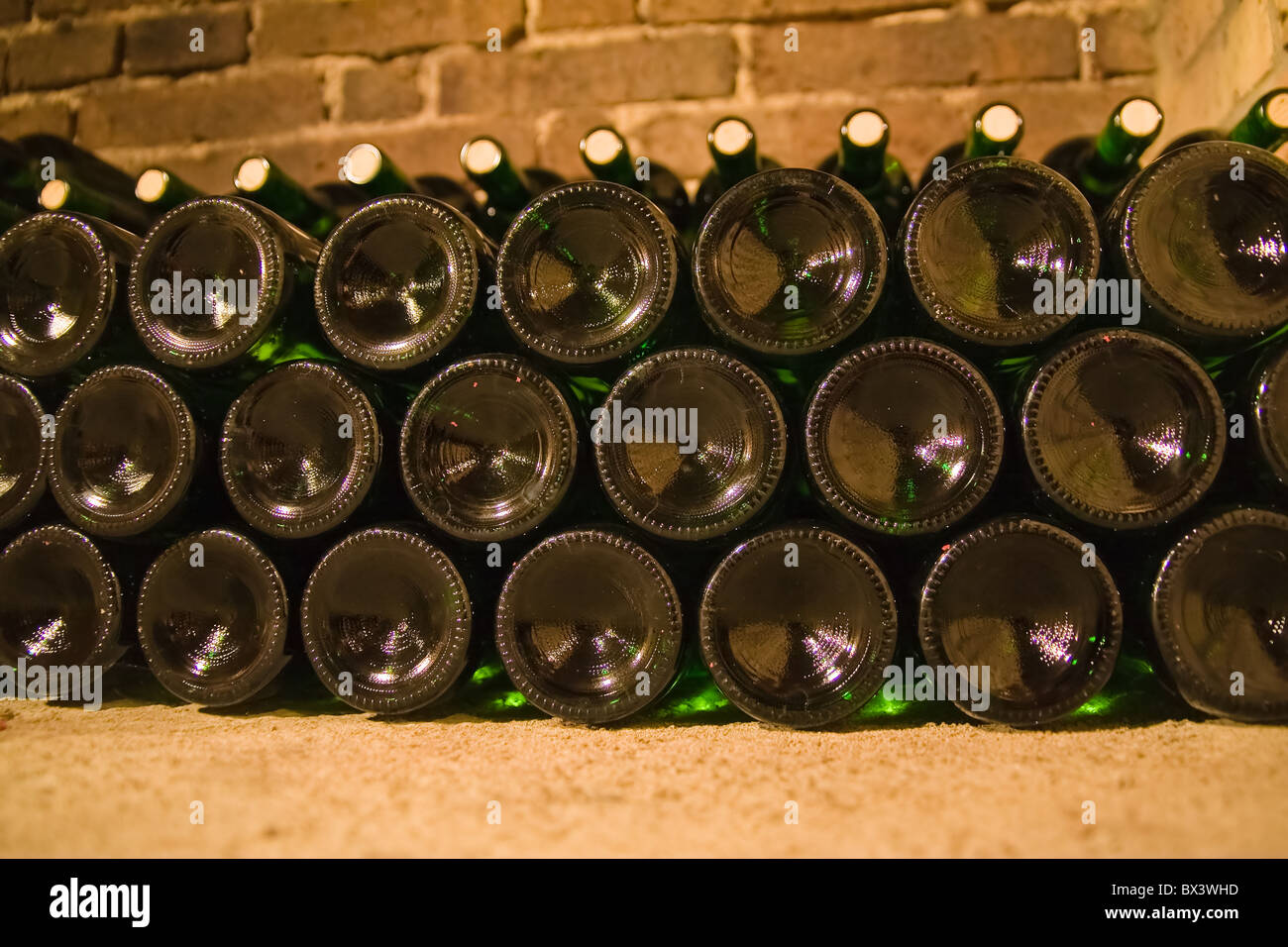 stacked up wine bottles in the cellar Stock Photo Alamy