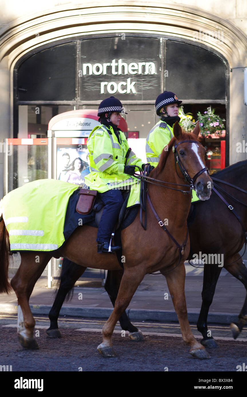 Police horses on patrol outside Northern Rock Manchester Stock Photo