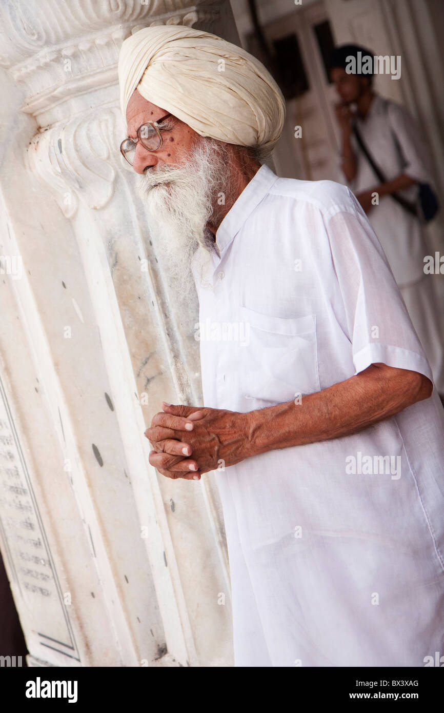 an old Sikh praying, Golden Temple Stock Photo