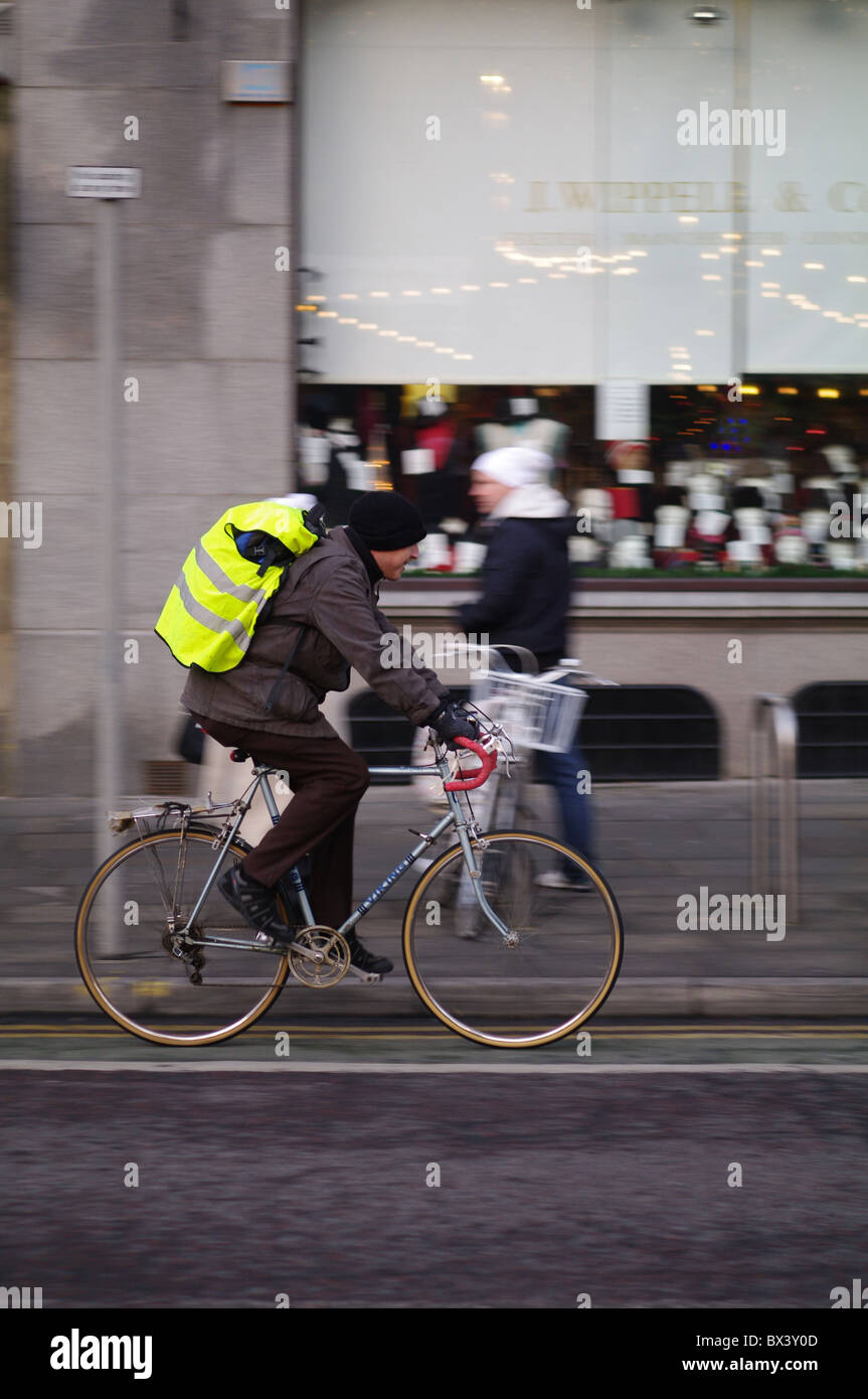 Cyclist riding bike in city hi-res stock photography and images - Alamy
