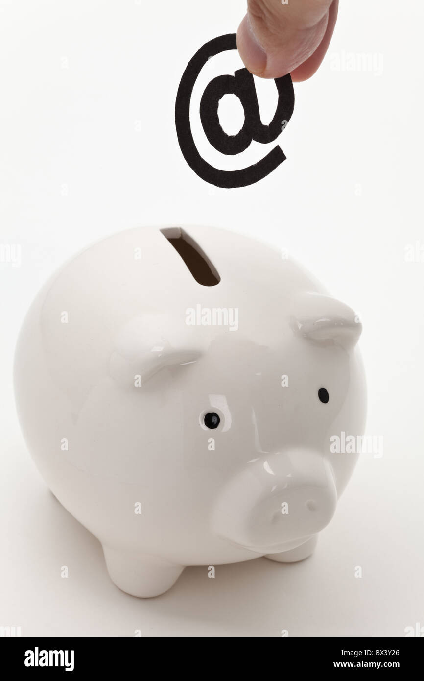 email and piggy bank, concept of E-commerce Stock Photo