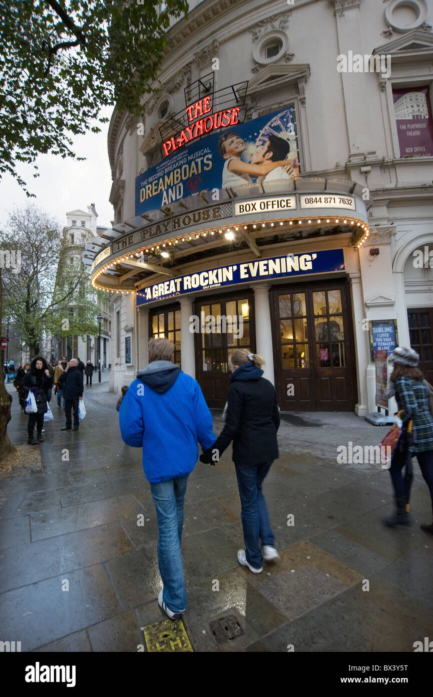 tourists outside the playhouse theatre london england Stock Photo