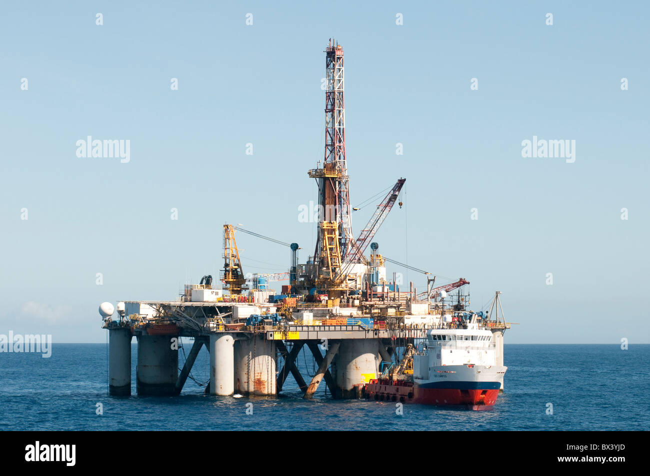 Supply vessel CBO Campos in operation with Petrobras drilling rig.  Coast of RIo de Janeiro, Brazil. Stock Photo