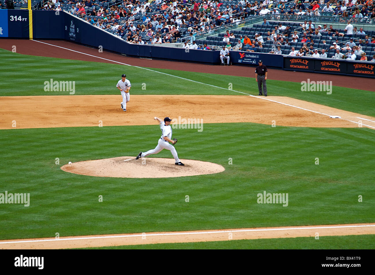 Spilled Plastic Logo Cup of Cola Soda at a Yankees Baseball Game at Yankee  Stadium in The Bronx New York City USA Stock Photo - Alamy