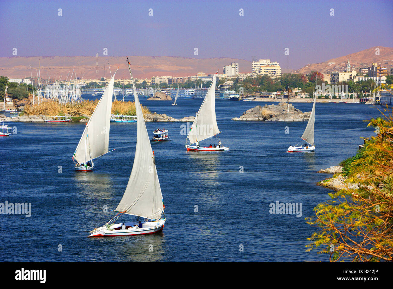 Egypt North Africa Aswan Nile river Felucca boats desert scenery Stock ...