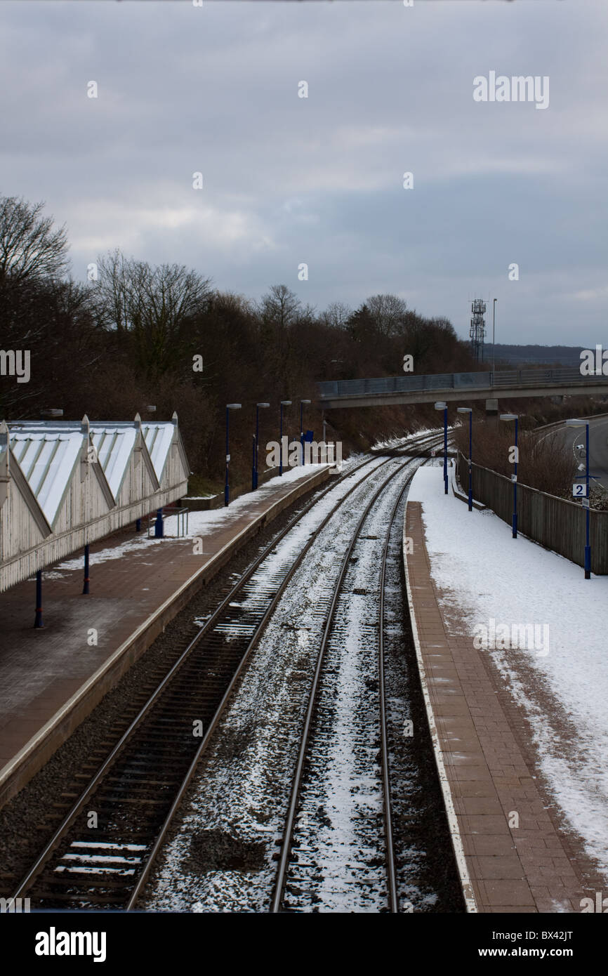 Snow covered railway track at Wendover Railway Station, Buckinghamshire. Wendover is a small village in the Chilterns. Stock Photo