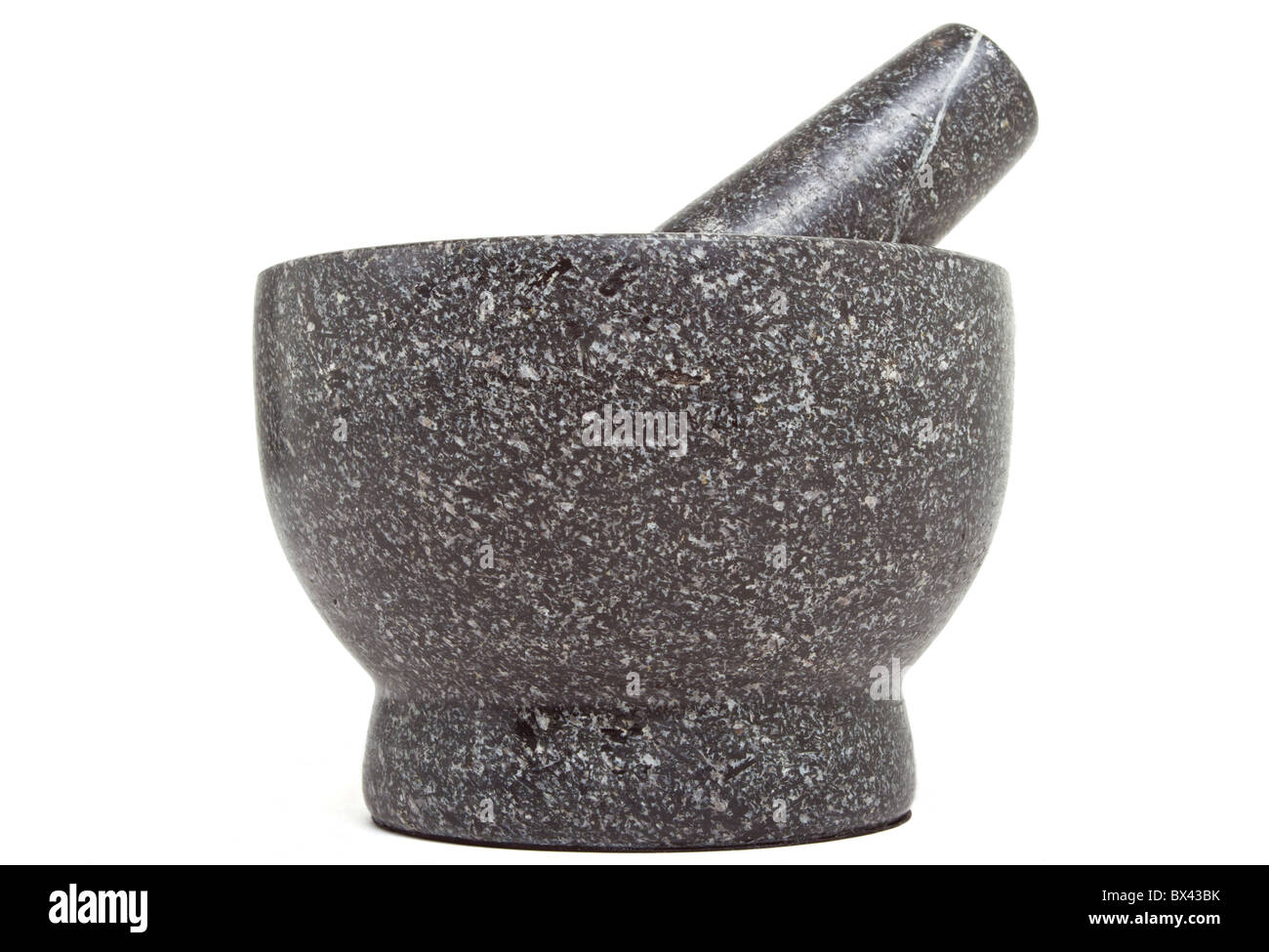 Veined Granite Mortar and Pestle isolated on white background. Stock Photo