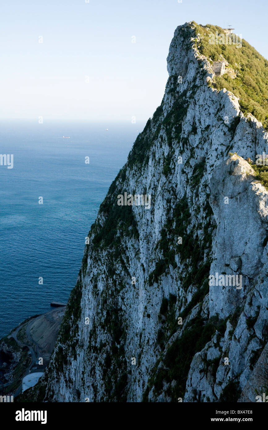 Cliff on the side of the Rock of Gibraltar, and peak top. Stock Photo