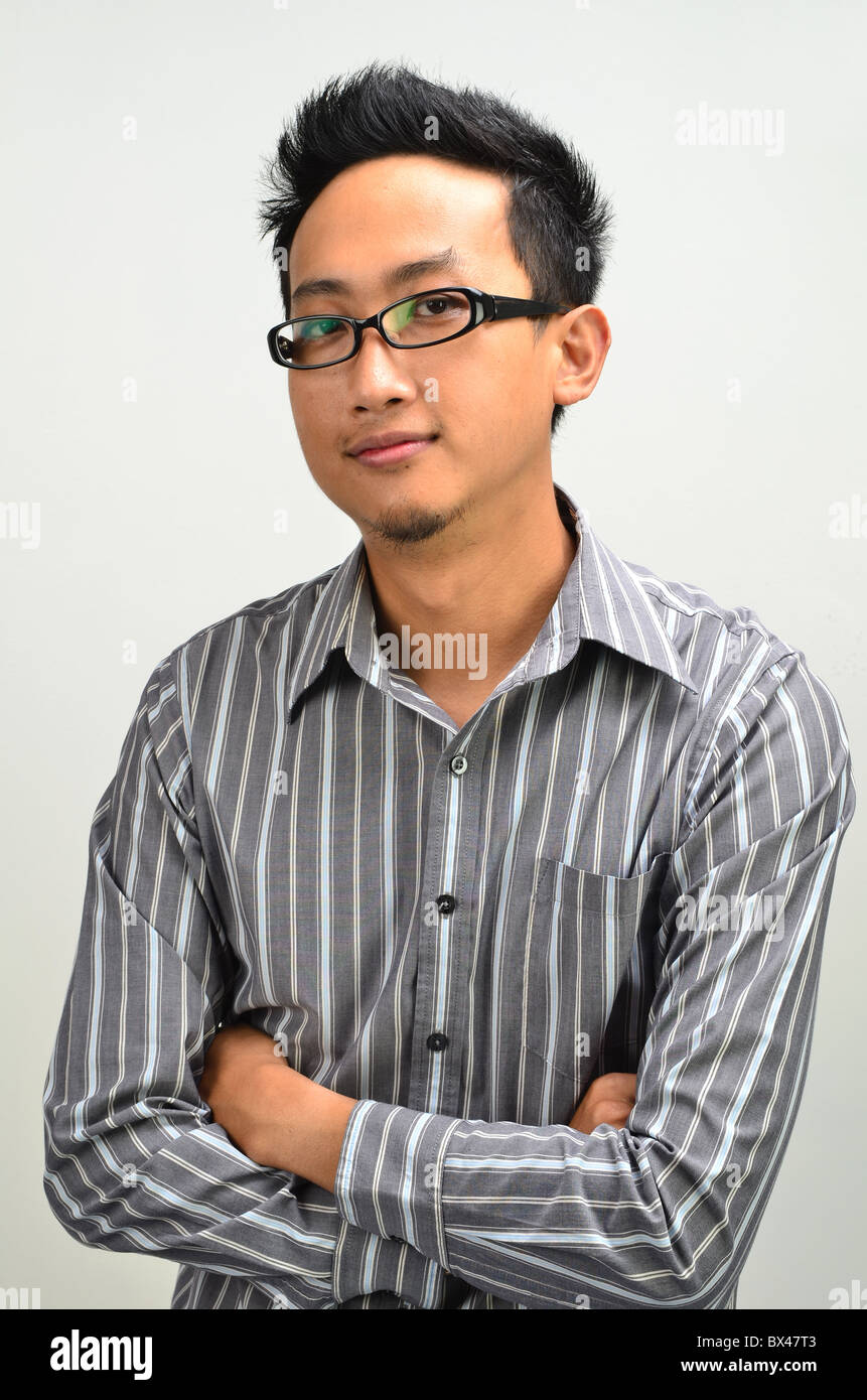 young asian business man smiling Stock Photo - Alamy