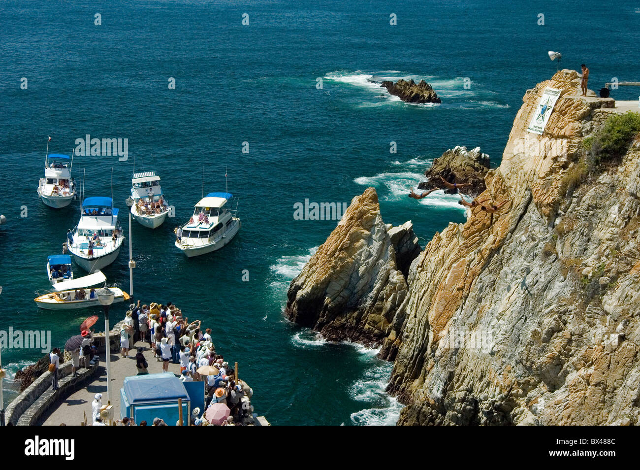 cliff jumpings cliff jumpers rocks coast cliffs sea La Quebrada Cliffs