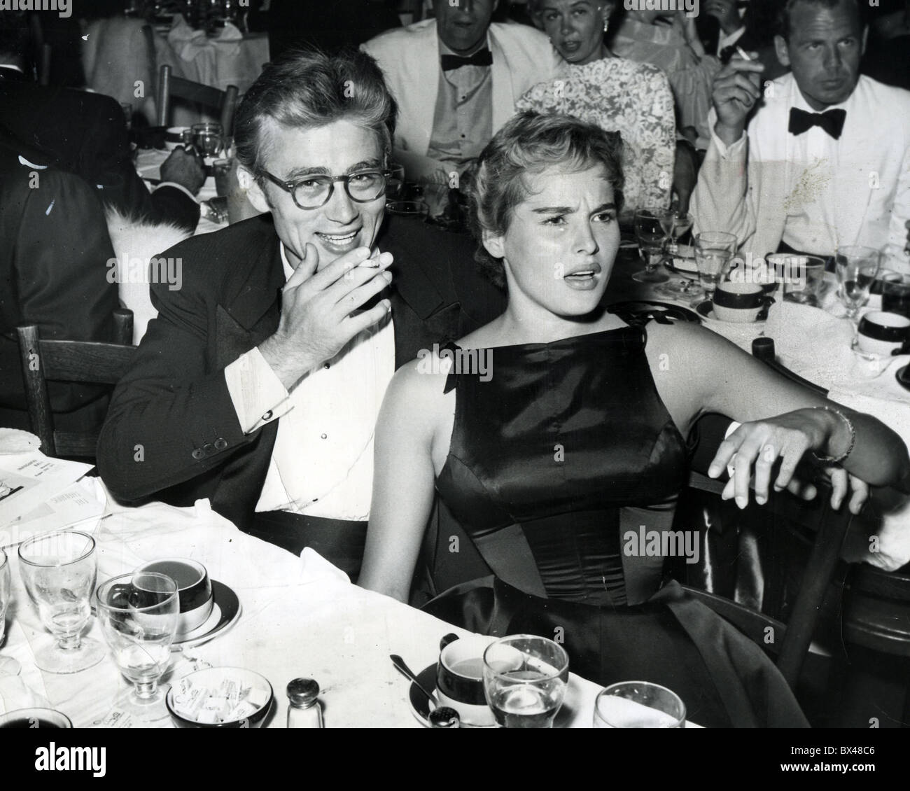 JAMES DEAN with Ursula Andress at a Hollywood lunch about 1955 Stock