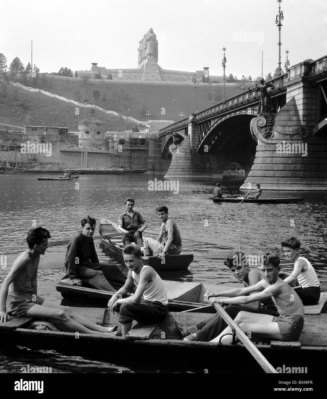 rowing boats, the Vltava, Prague,children, boys, Stalin memorial monument Stock Photo
