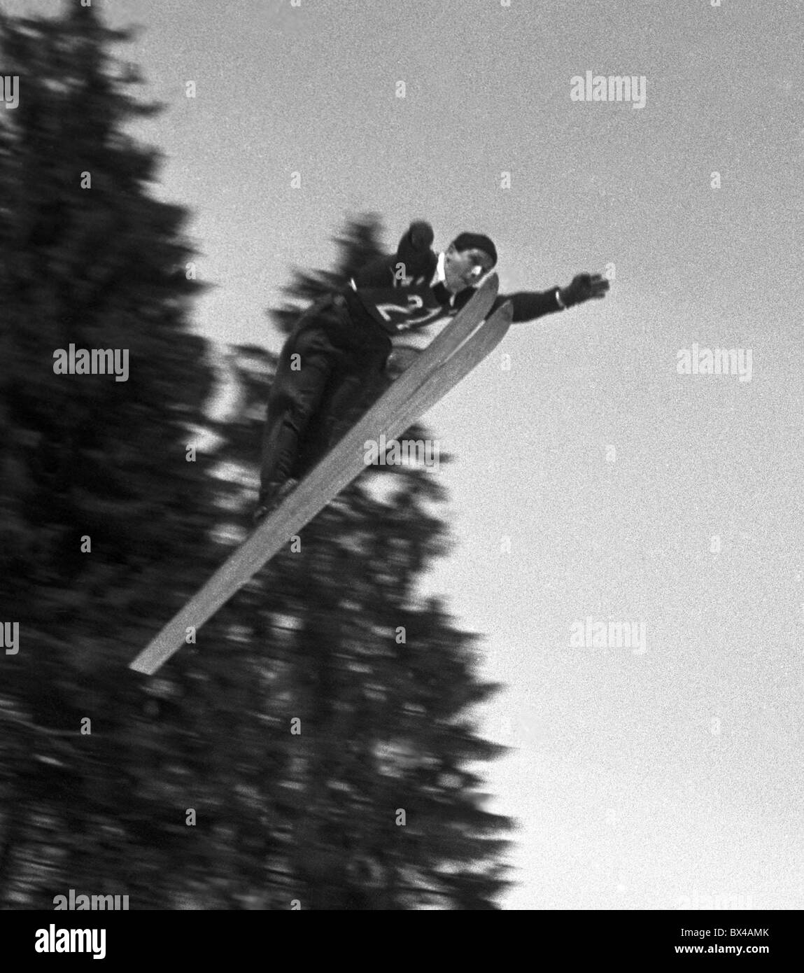 Spindleruv Mlyn, 1949.  Ski jumper is airborne during his attempt. CTK Vintage Photo Stock Photo