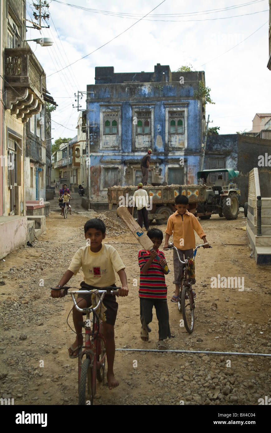 Children playing in the street in Diu Town on the Island of Diu, India Stock Photo