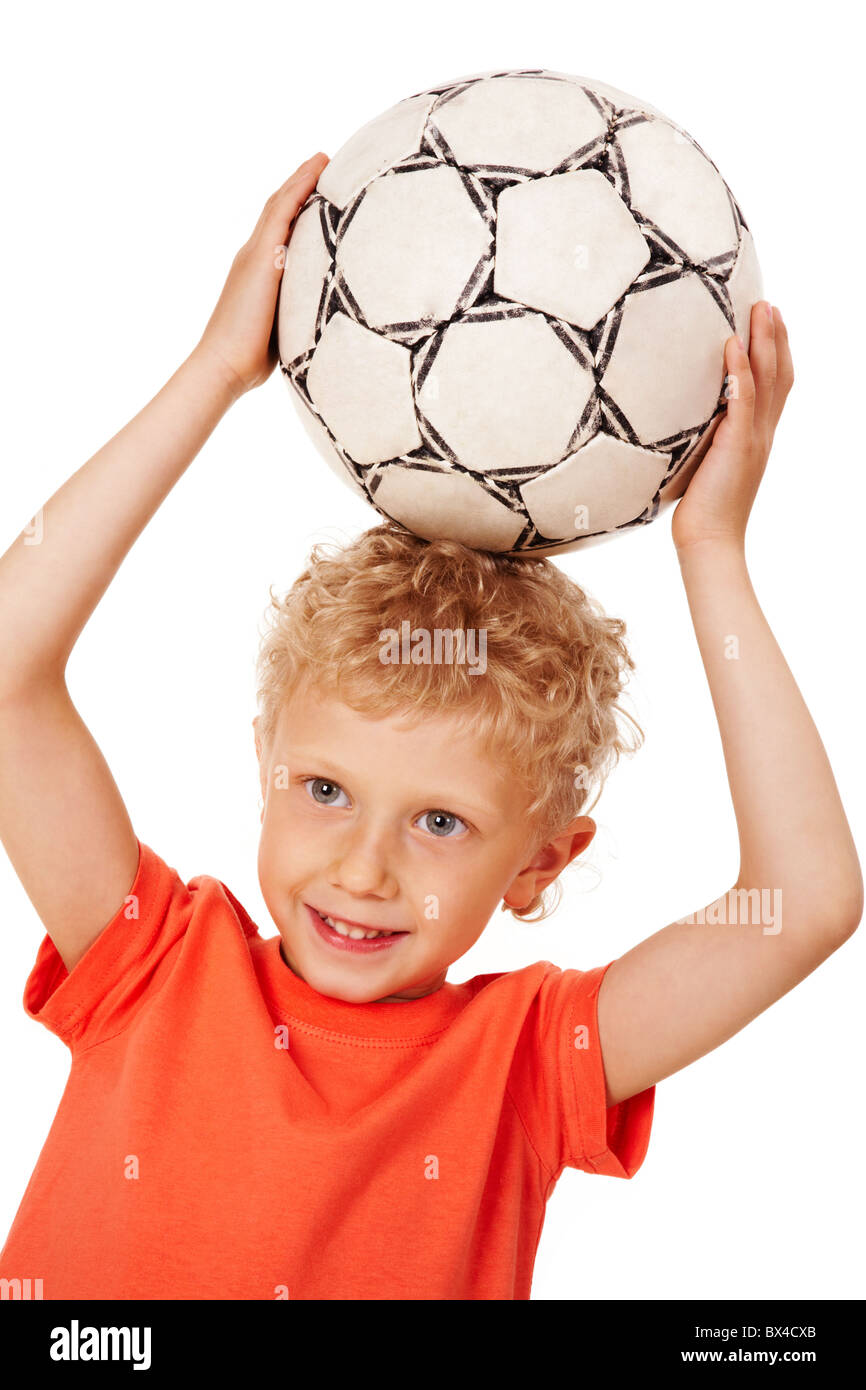 Image of sport boy holding ball over head Stock Photo Alamy