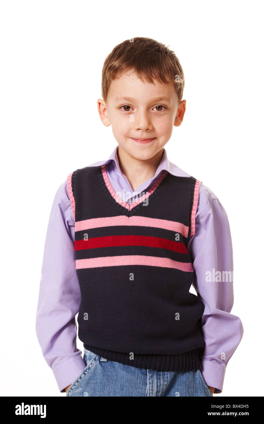 Portrait of smiling boy looking at camera over white background Stock ...
