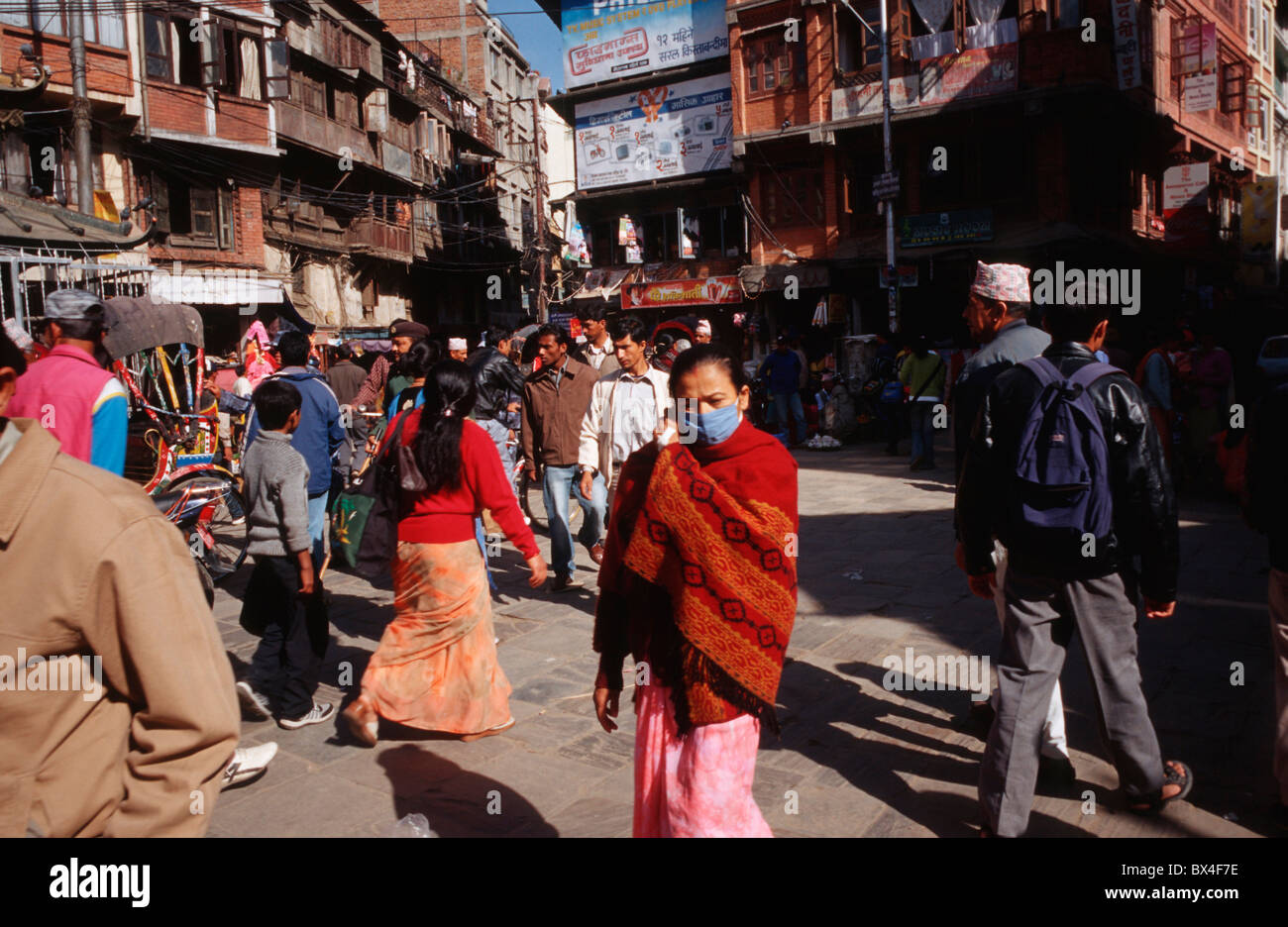woman mask sari dusty Smok allergy 3rd world Third World scrum person Asian Asiatic Nepali Newari Neware Stock Photo