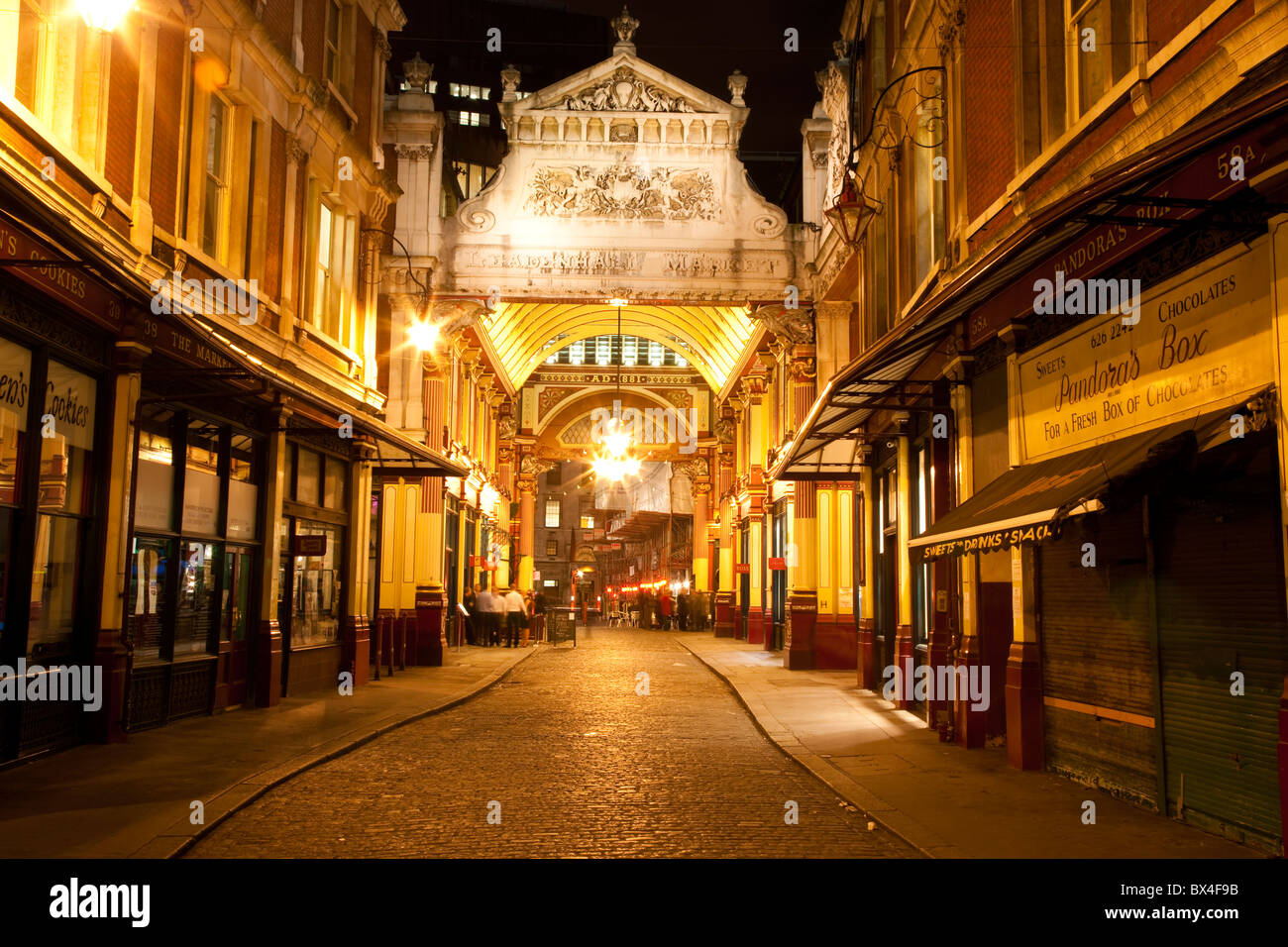 Old illuminated street in London at night Stock Photo
