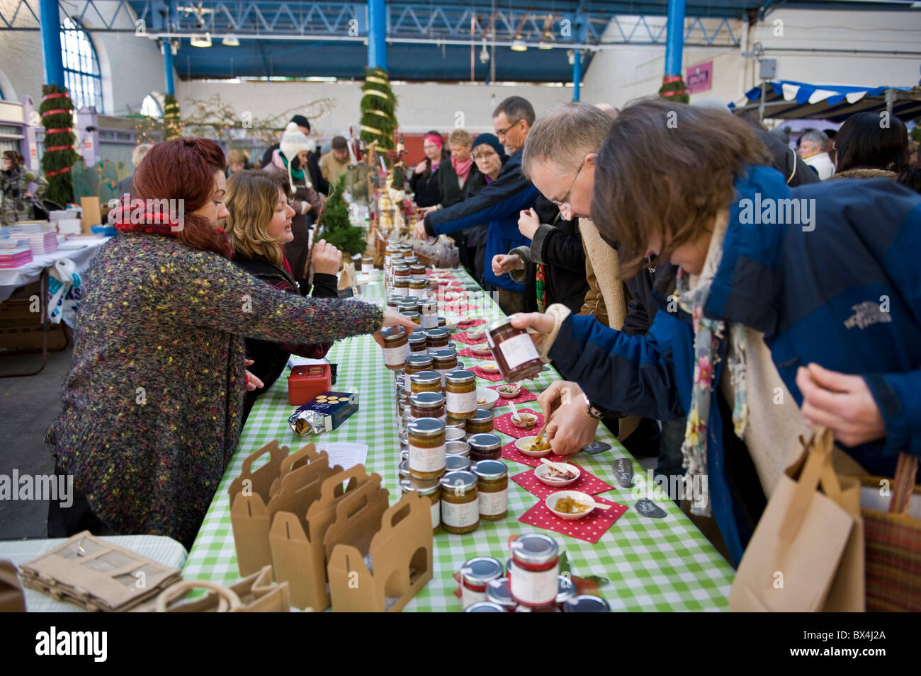 Customers sampling chutney on stall at Abergavenny Food Festival