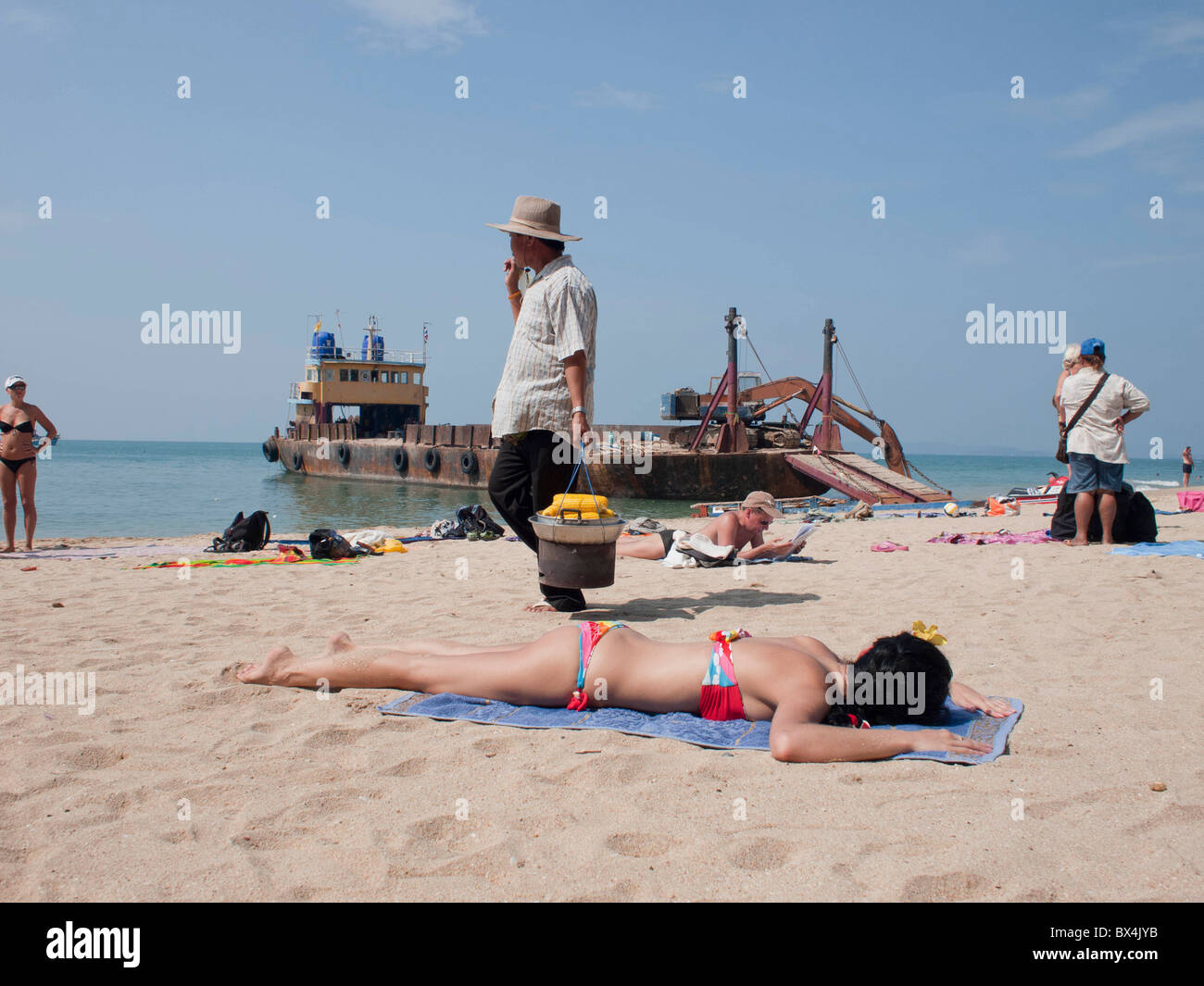 Young women enjoying sunbathing on thailand beach Stock Photo