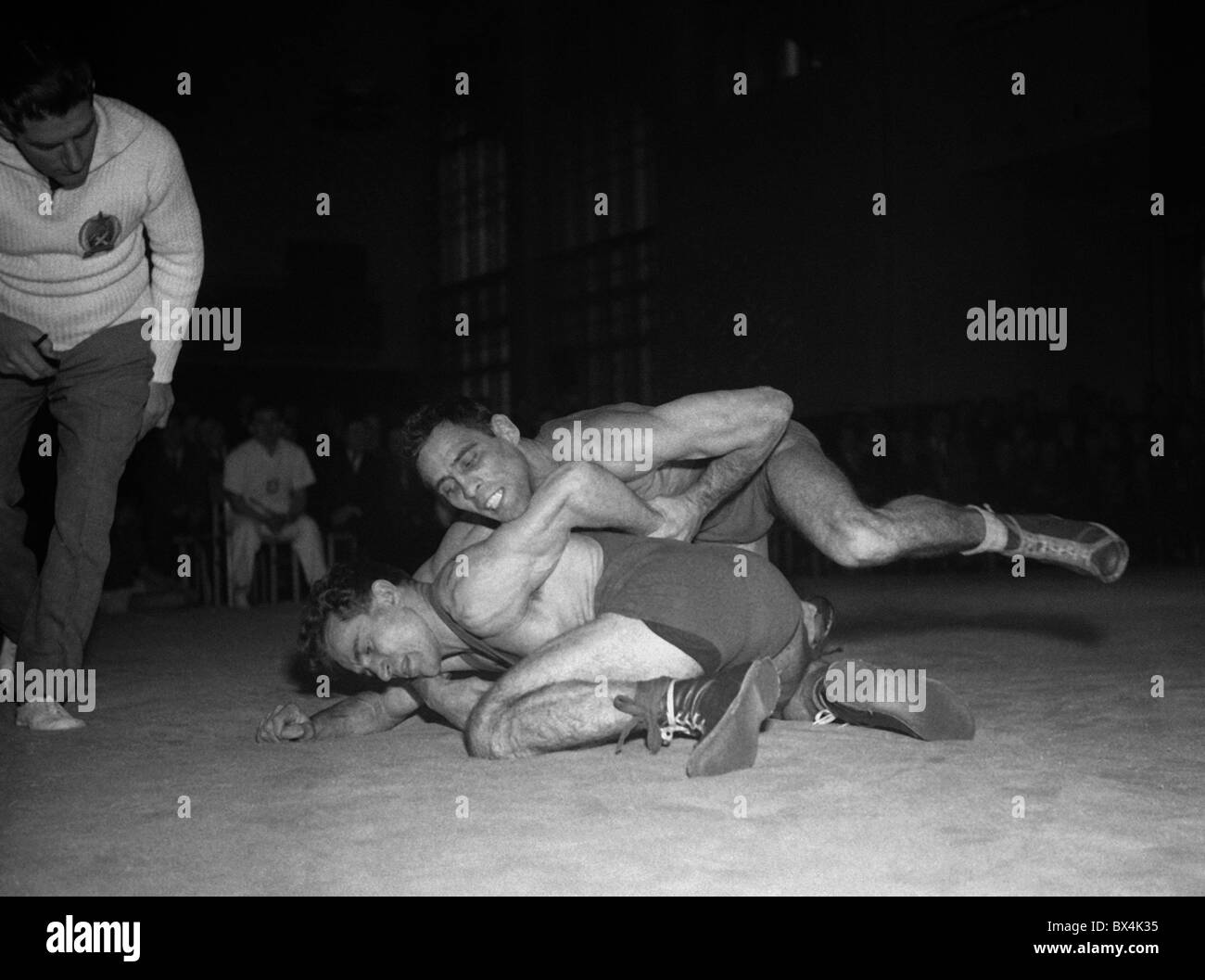 Prague, Czechoslovakia - 1950. Greco - Roman wrestlers fight at VinohradyÂ´s Sokolovna. CTK Vintage Photo Stock Photo