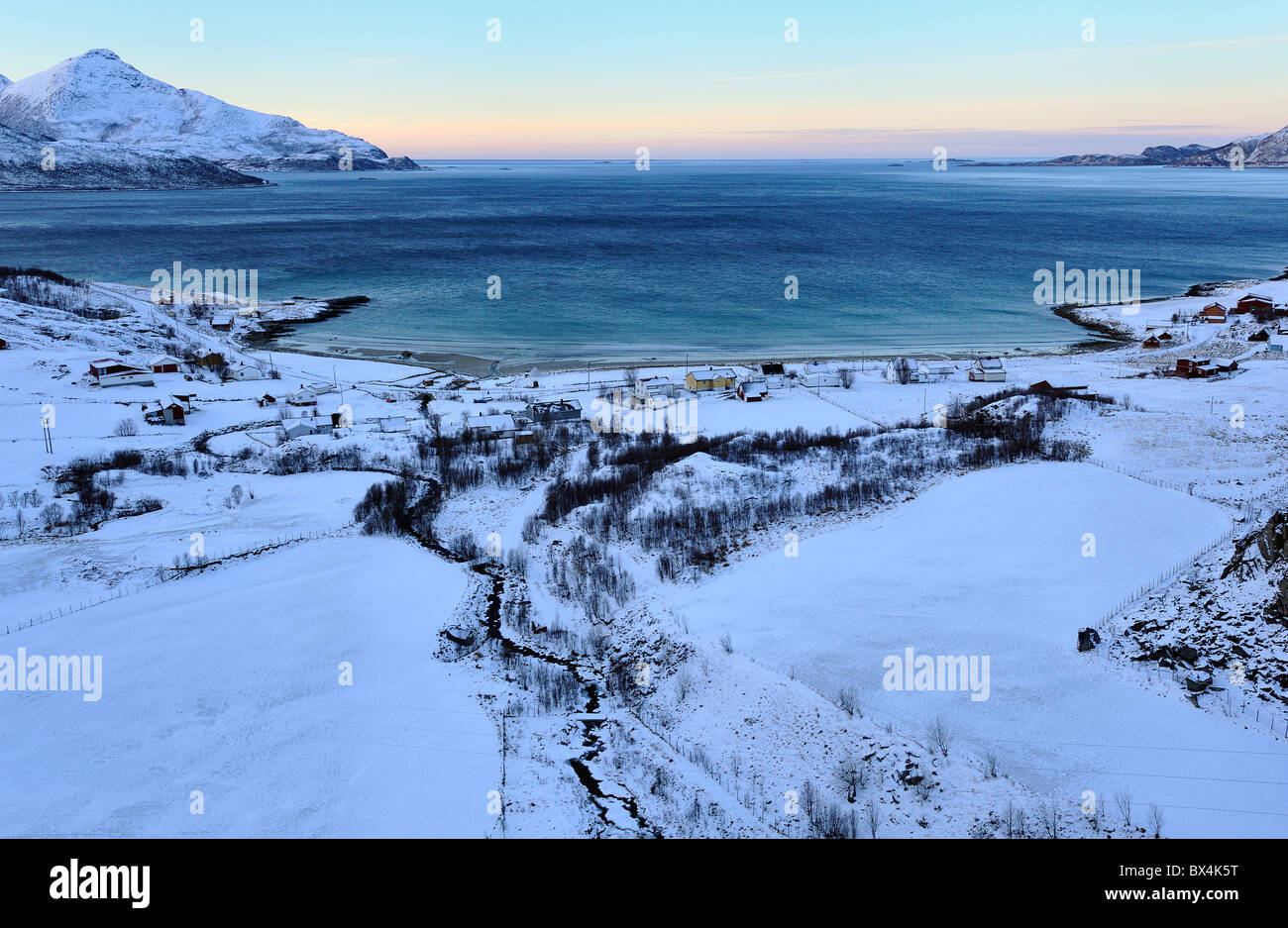 The small village Grotfjord by the open sea a cold winter day.  Troms, North Norway Stock Photo