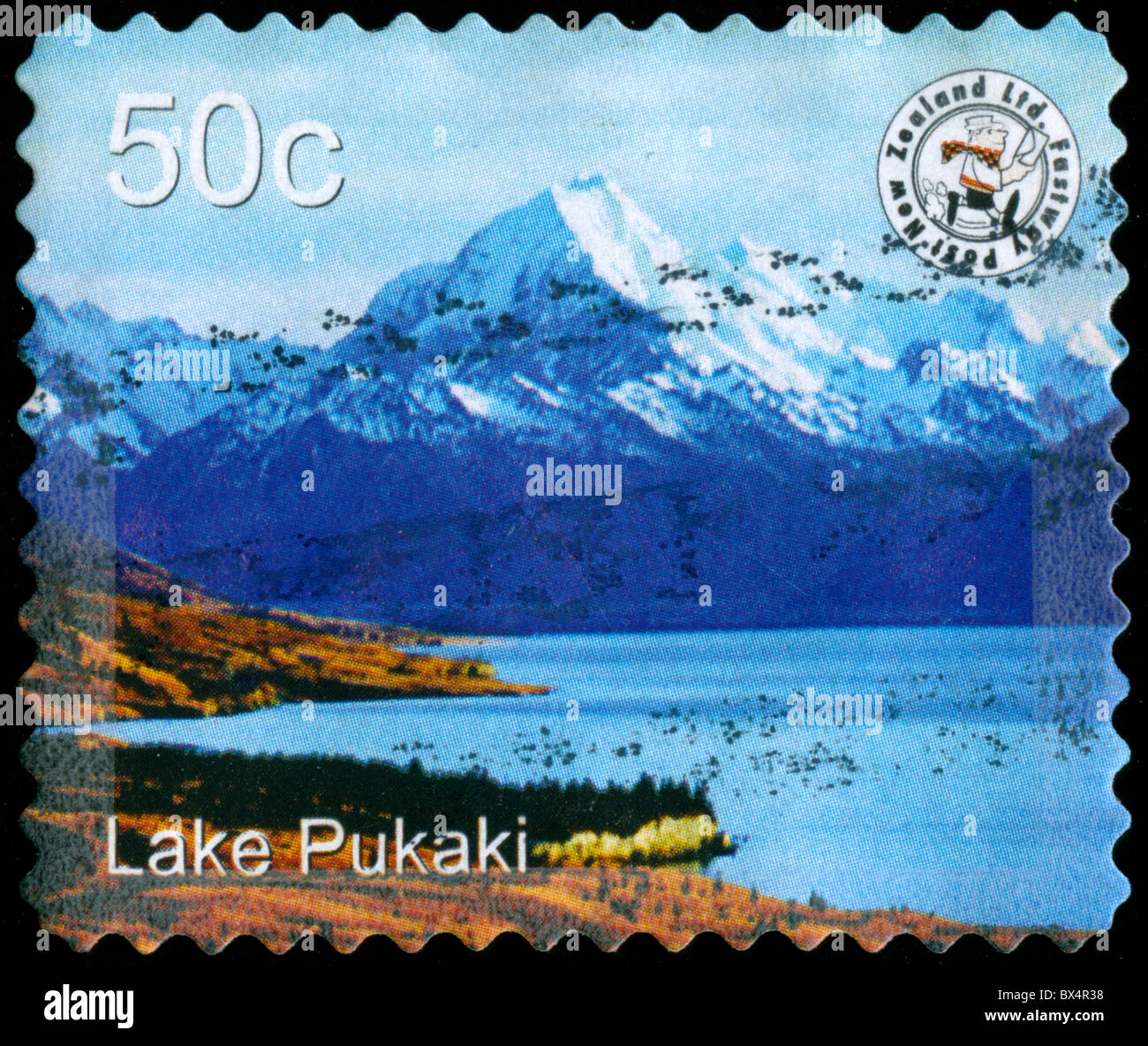 Used postage stamp from New Zealand with picture of Lake Pukaki Stock Photo