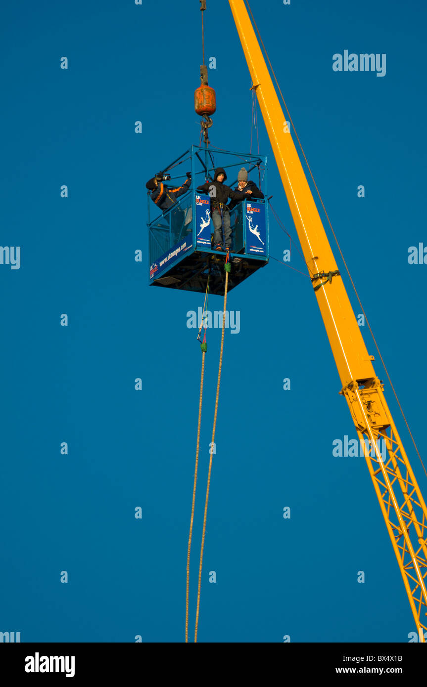 Bungee jumping from a crane, Salford Quays, Manchester, England, UK
