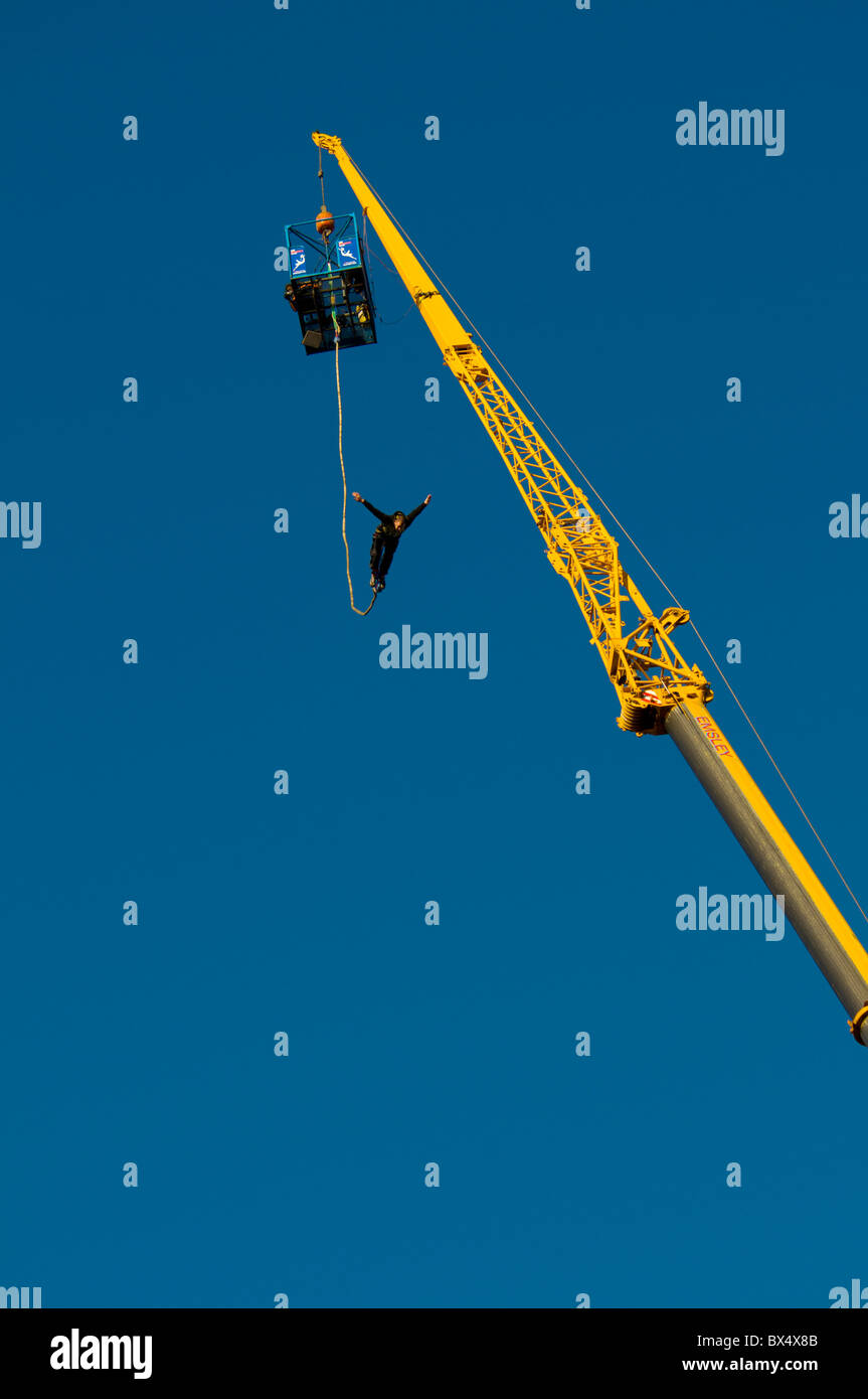 Bungee jumping from a crane hires stock photography and images Alamy