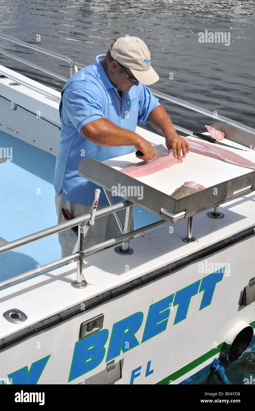 Fish man boat hires stock photography and images Alamy