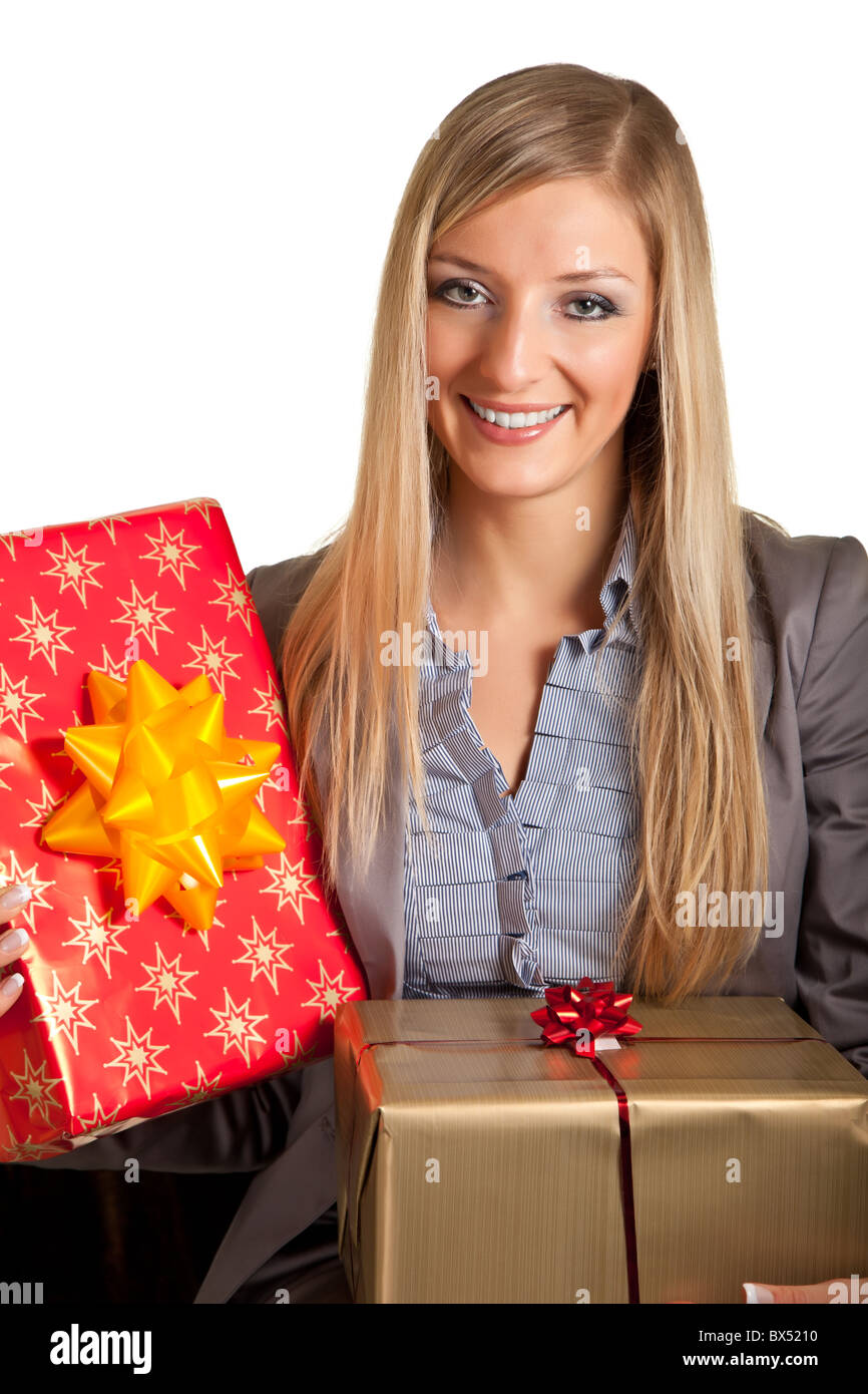 Blond caucasian woman in formal dress with christmas presents gift boxes isolated on white Stock Photo