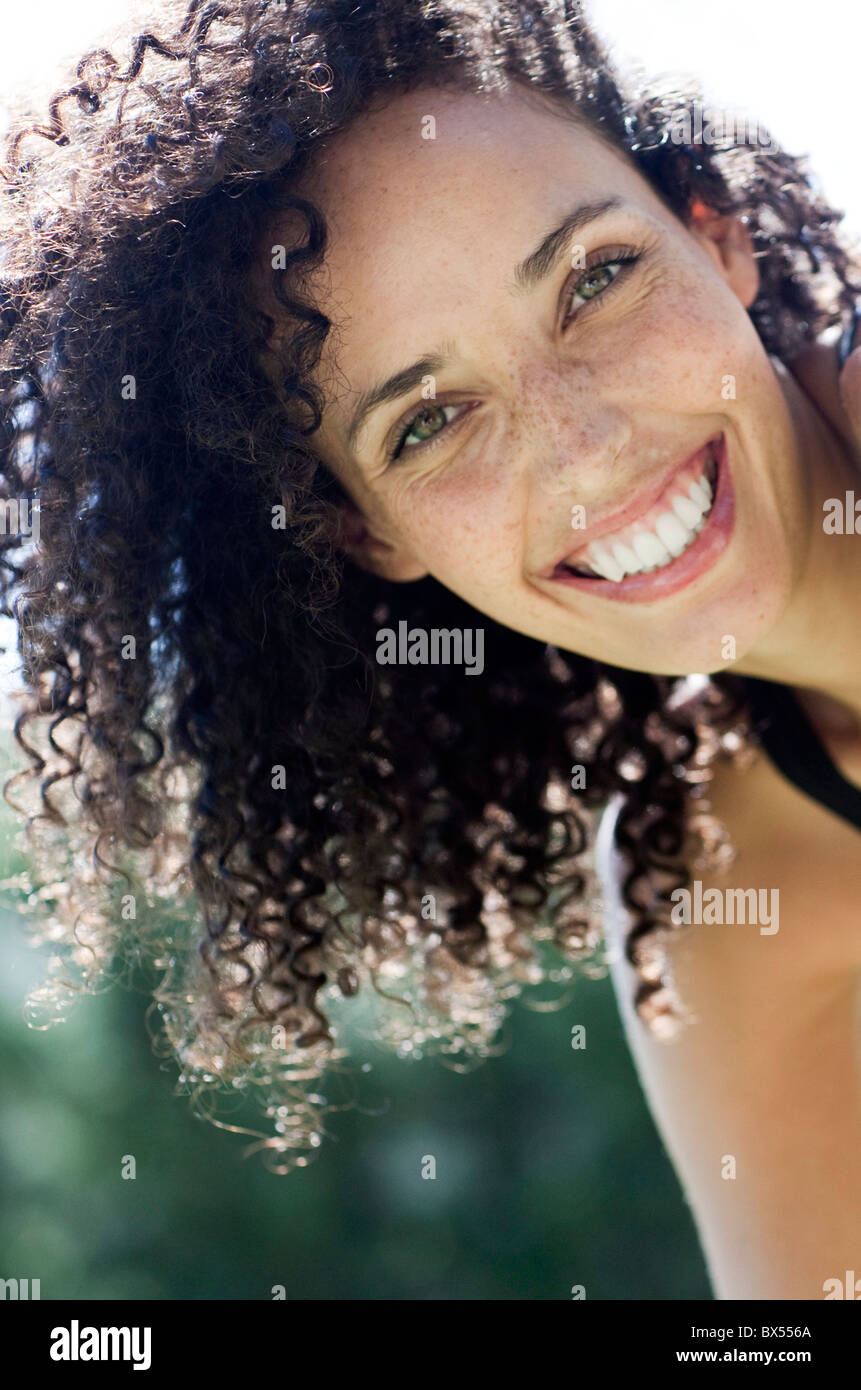 Curly brown hair woman hi-res stock photography and images - Alamy