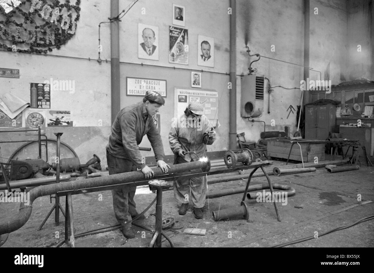 Factory workers, Communist propaganda, Klement Gottwlad, posters Stock Photo