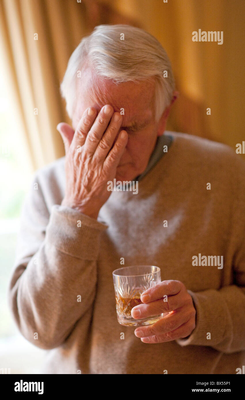 Depressed senior man Stock Photo