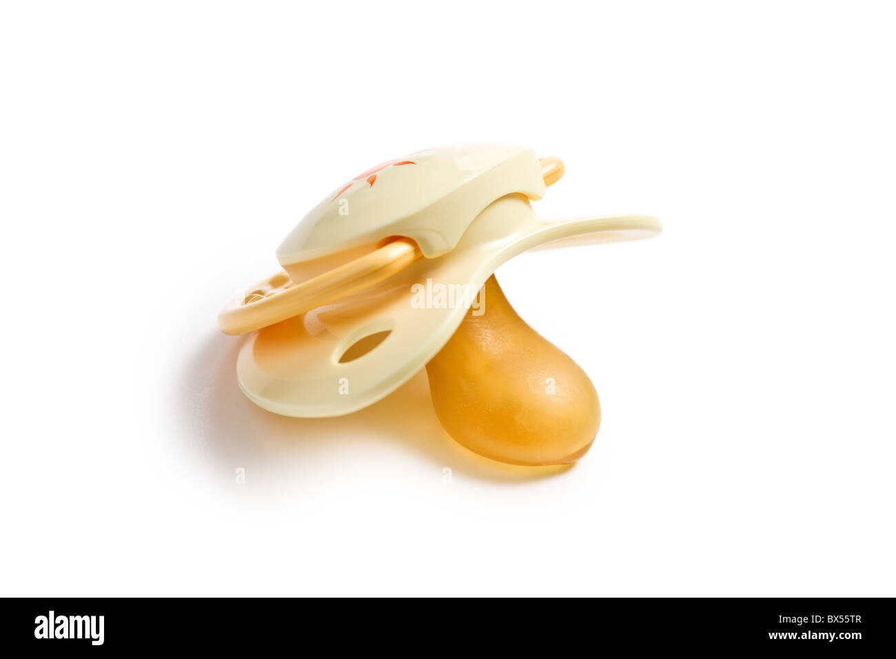 yellow pacifier on white background Stock Photo Alamy