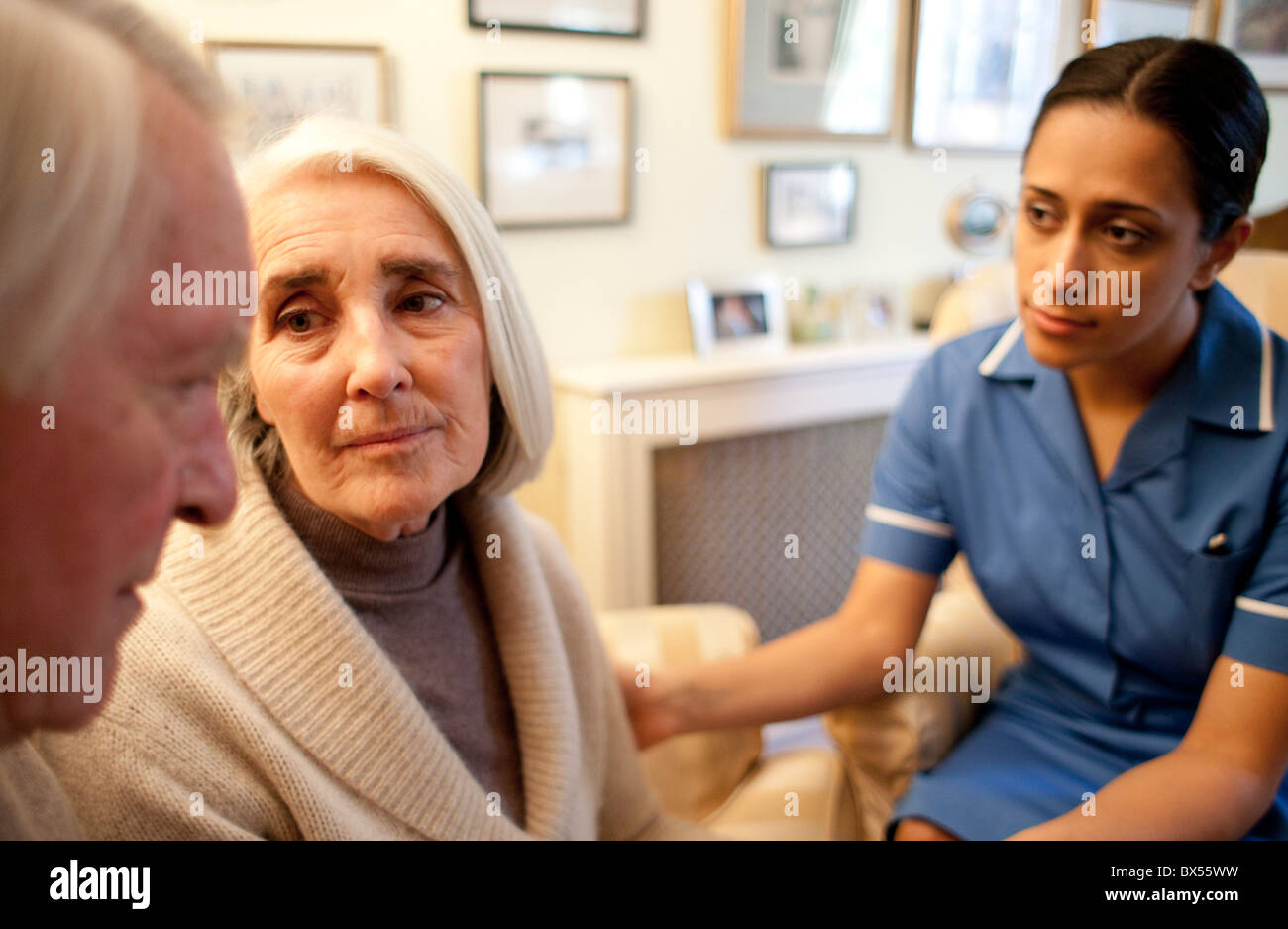 Nurse on a home visit Stock Photo